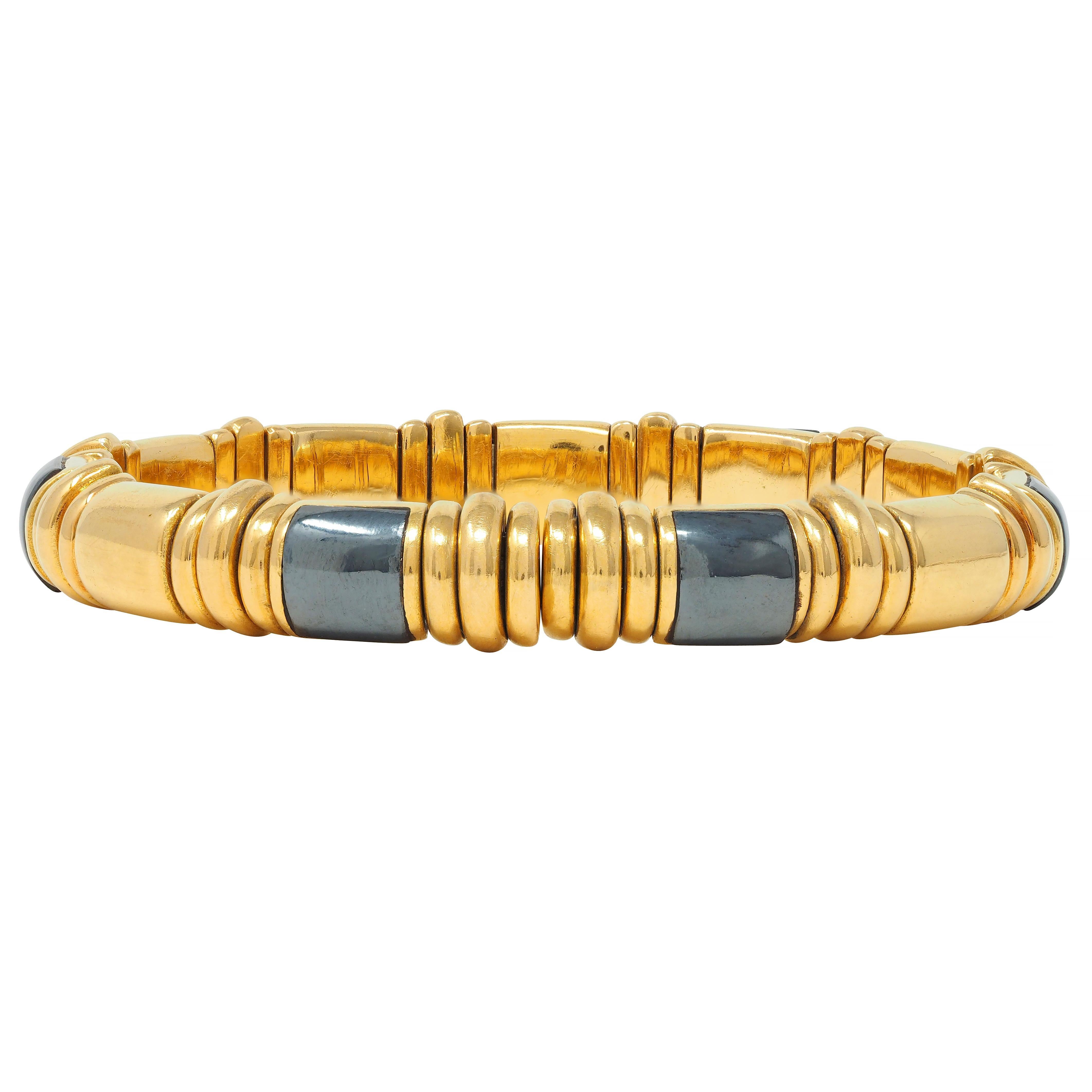 Modernist Bulgari 1990's 18 Karat Yellow Gold Hematite Vintage Tubogas Cuff Bracelet For Sale