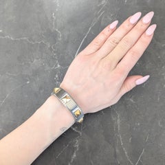 Bracciale Bulgari anni '90 in oro giallo 18 carati con borchia in acciaio Tubogas Vintage
