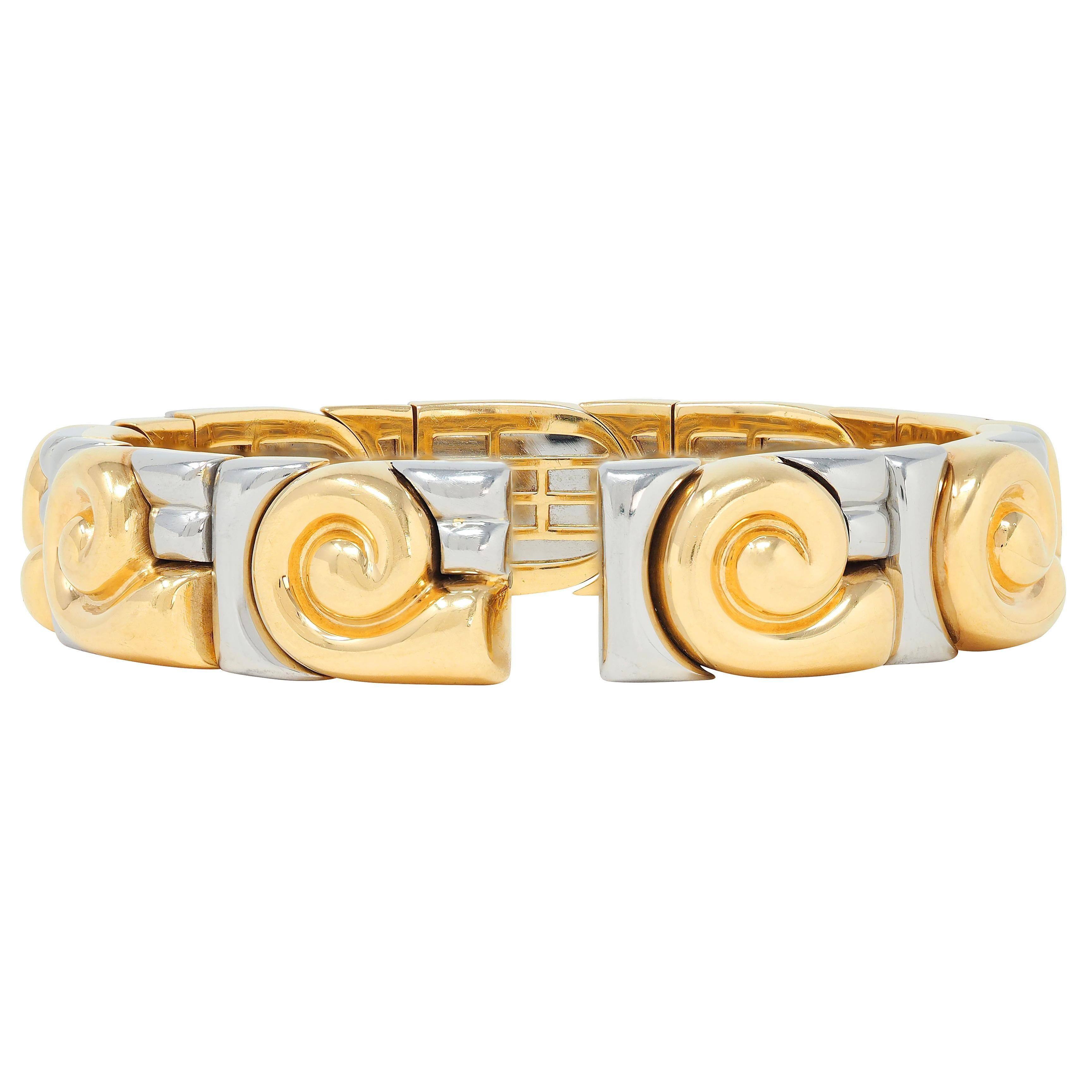 Bracelet manchette Bulgari 1990, or 18K, acier inoxydable, vintage Saetta Swirl Excellent état - En vente à Philadelphia, PA