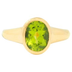 Bulgari 1990s Peridot 18 Karat Yellow Gold Vintage Bezel Ring