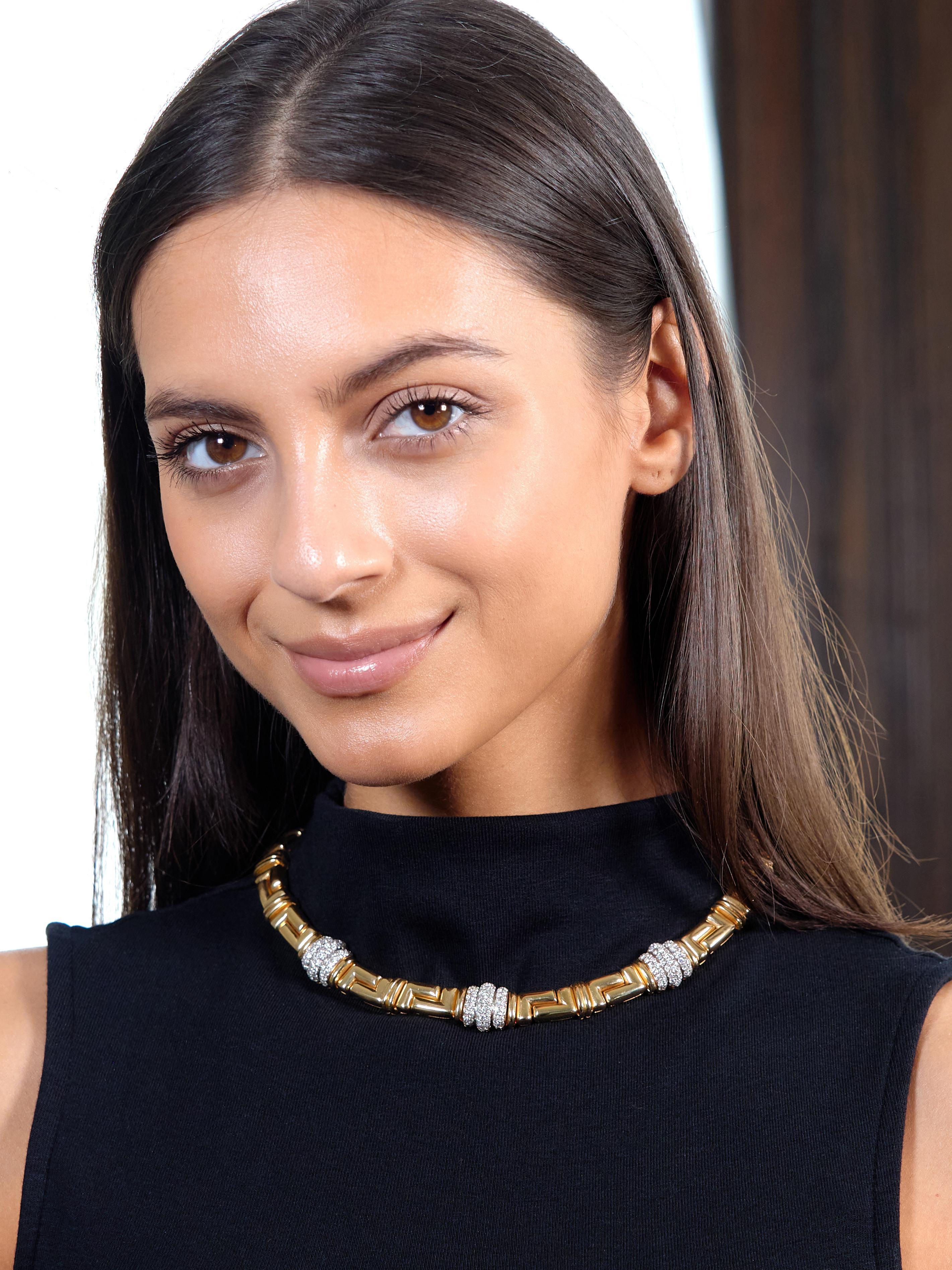 Comprised of fitted geometric articulated 'L' style links further accented by double bar links
Featuring segments of channel set round brilliant cut diamonds
Weighing approximately 4.50 carats total - F/G color with VS clarity
With a high polish