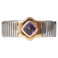 Bulgari 4ct Sugarloaf Amethyst Gold Steel Tubogas Bangle, Circa 1990
