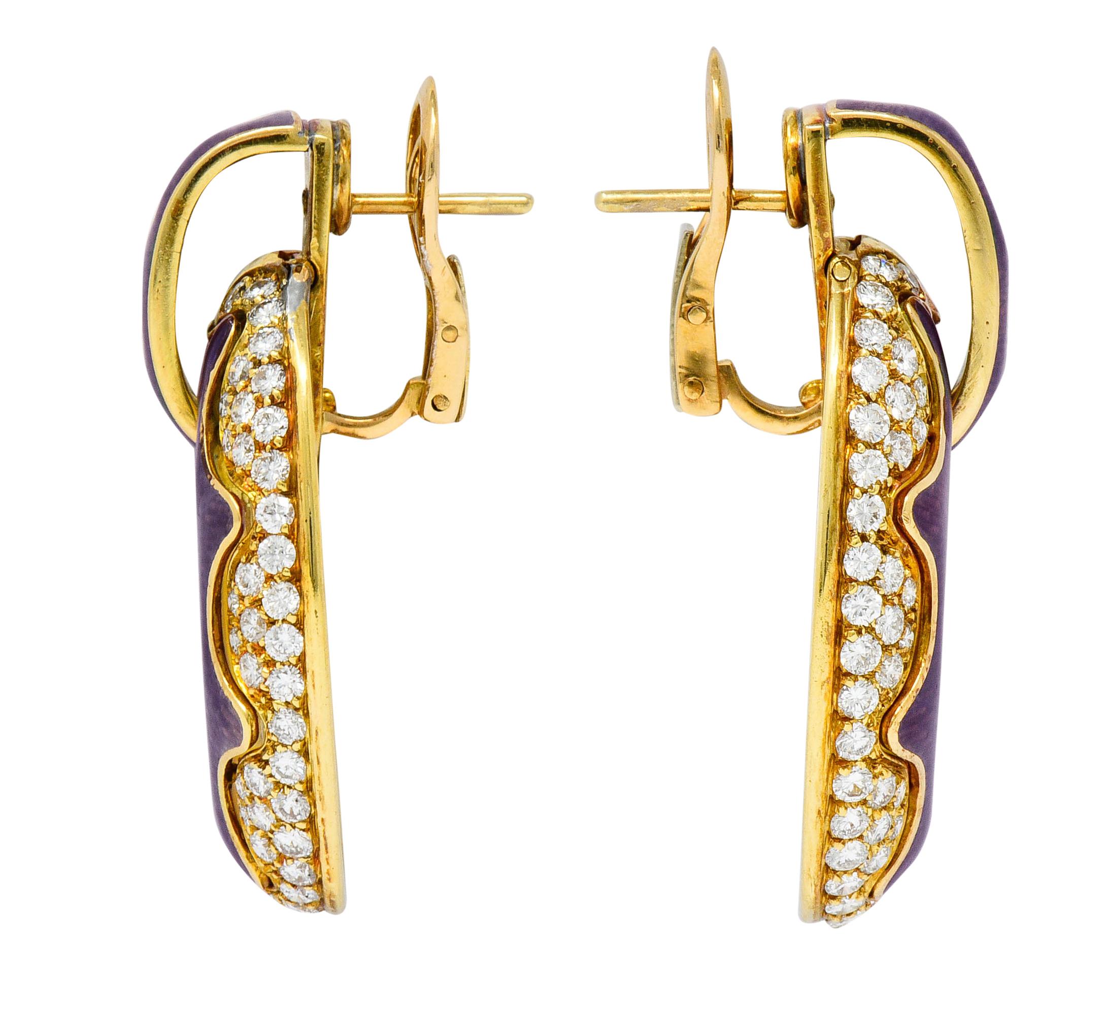 Doorknocker style earrings featuring a scalloped design glossed with lavender enamel

Exhibiting no loss and a subtle burst motif

Pavé set throughout by round brilliant cut diamonds weighing in total approximately 5.50 carats; G to H color with VS