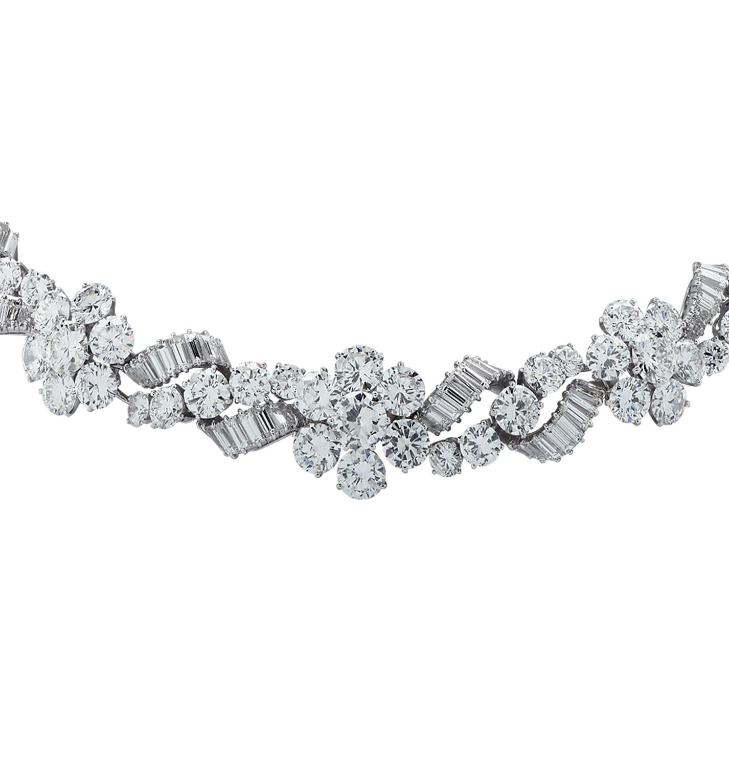 Exceptional French Bvlgari diamond necklace, circa 1960, crafted in platinum, showcasing round brilliant cut diamonds and baguette cut diamonds weighing 80.25 carats total, D-E-F color, VS-VVS clarity. Round brilliant cut diamonds are set in flower