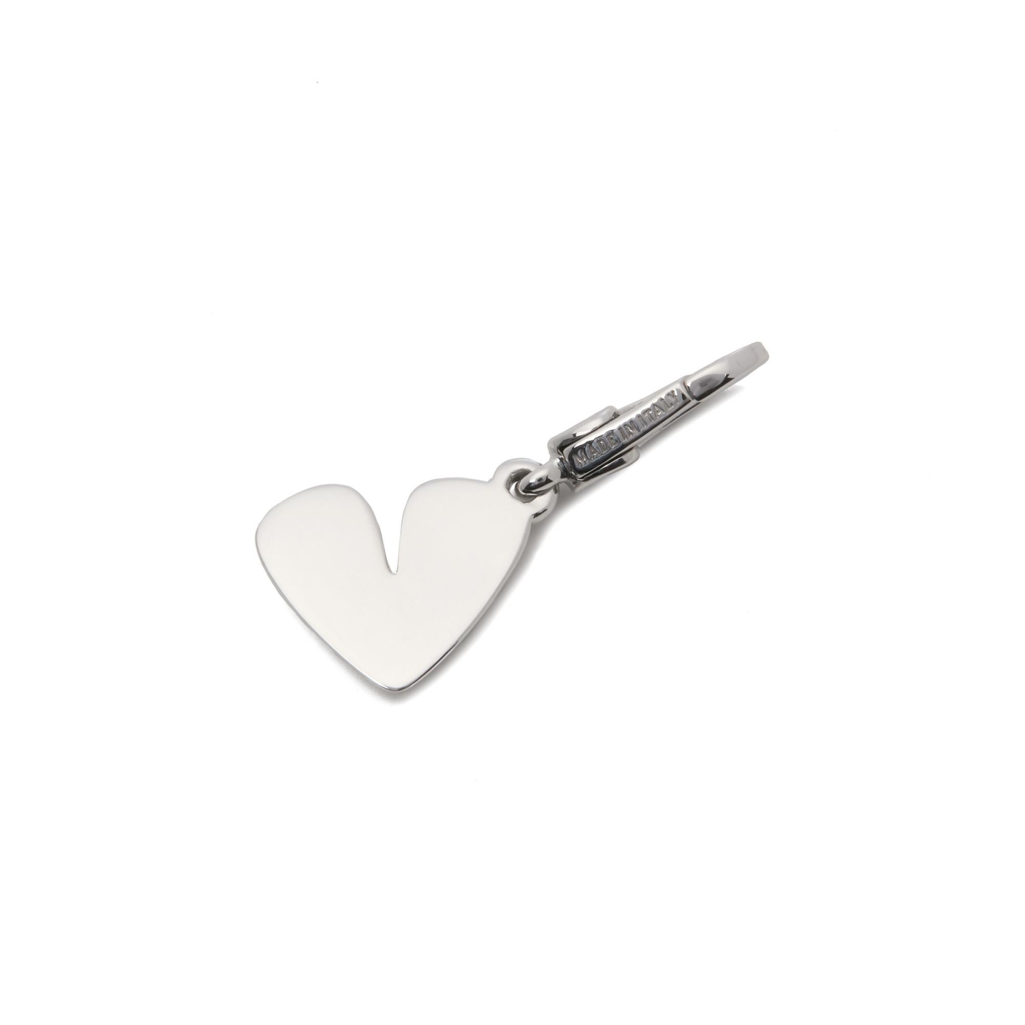 This charm by Buglari is from their Fancy Heart collection and features a slanted heart in 18ct White Gold. It can be worn as a charm on a bracelet or as a pendant on a necklace. Accompanied by a Xupes Presentation Box. Our Xupes reference is J949