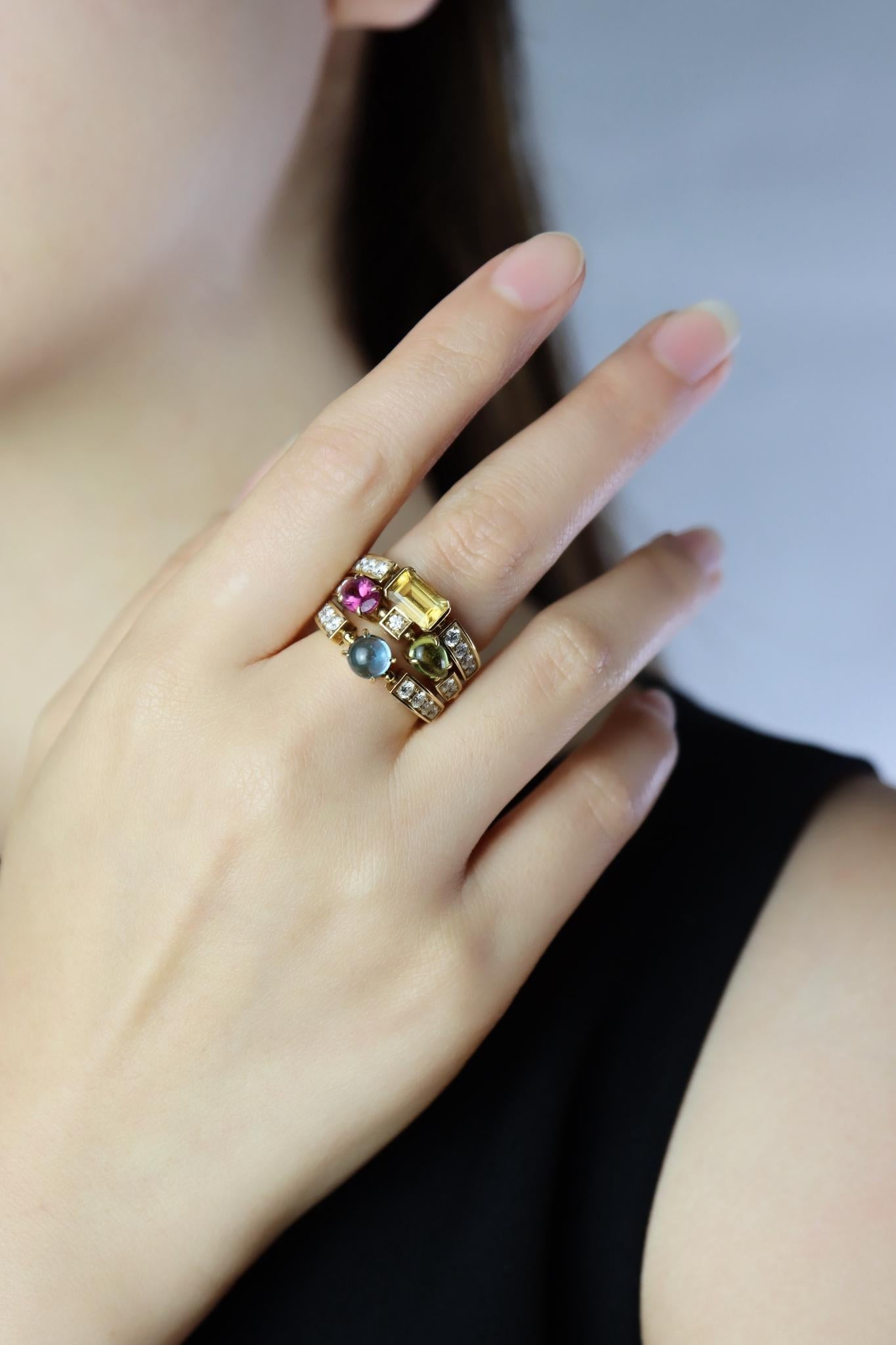 Bulgari Allegra Bague à diamants et pierres multiples
 
Pavé de diamants de taille ronde totalisant 0,60 carats
Tourmaline de taille ovale
Citrine taillée en rectangle
Péridot taillé en poire
Topaze taillée en rond

Marqué