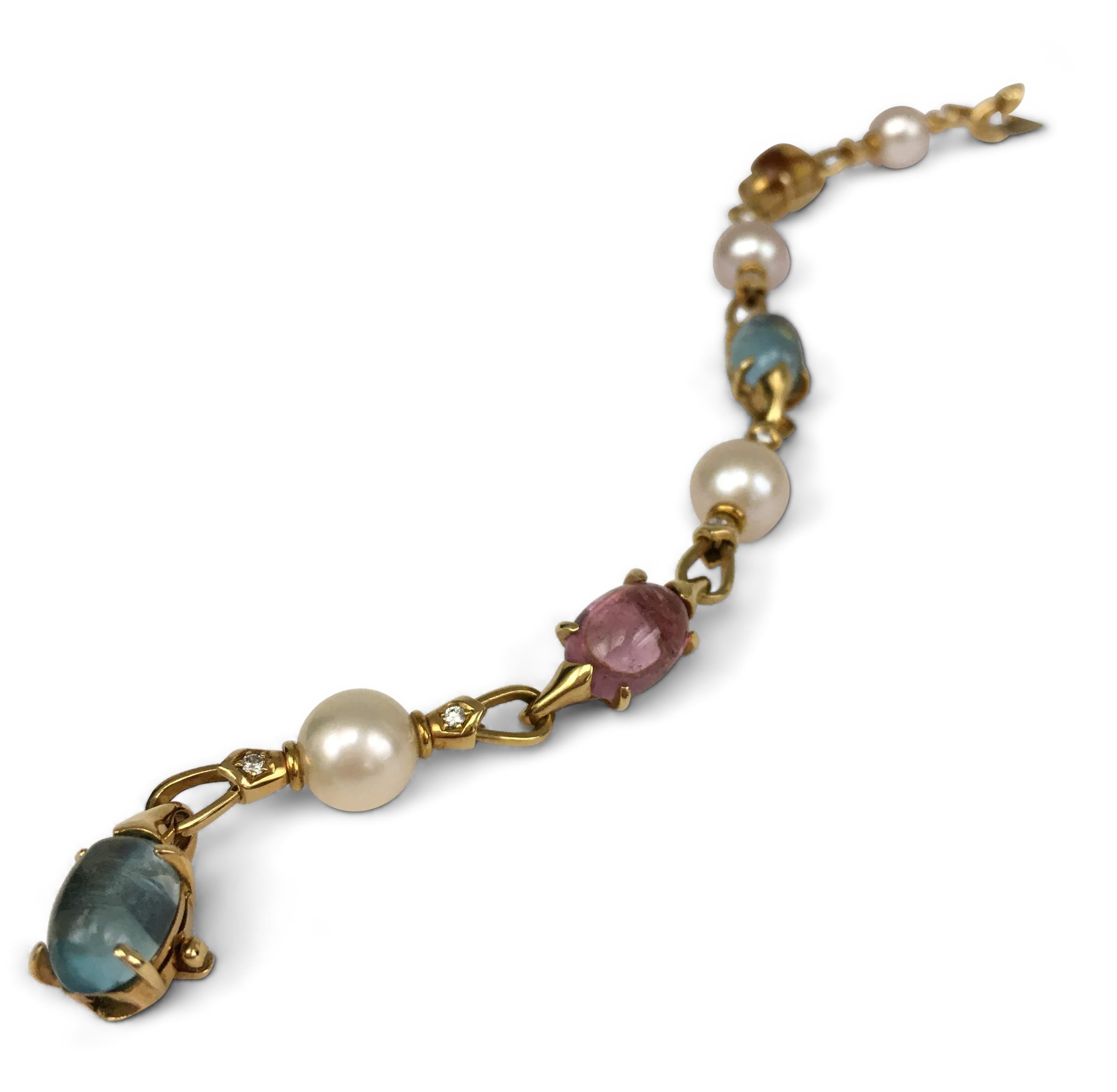 Authentic Bulgari Allegra bracelet crafted in 18 karat yellow gold and set with cabochon-cut blue topaz, citrine, and tourmaline stones alternating with cultured pearls. The bracelet links are accented with round brilliant cut diamonds weighing an