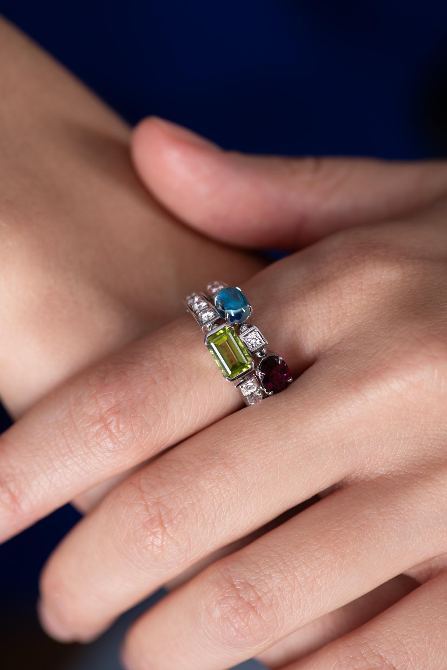 BVLGARI ring from the Allegra collection in 18k white gold, colored stones and diamonds.
Condition: excellent.
Size: 52.
Possible resizing: +/- 2 sizes.
Stones: peridot, topaz and pink tourmaline.
Total diamonds: 0.14 carat.
Total weight : 7.67