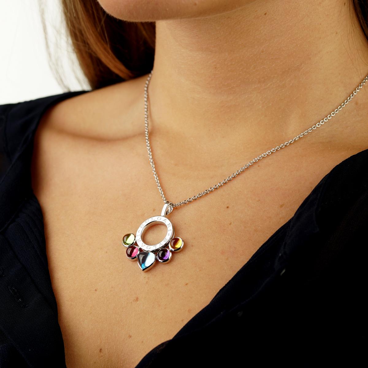 A fabulous Bulgari Allegra necklace featuring 5 multicolored gemstones set in 18k white gold. The 5 gemstones are bezel set and freely swing. The pendant is suspended by a Bulgari 16