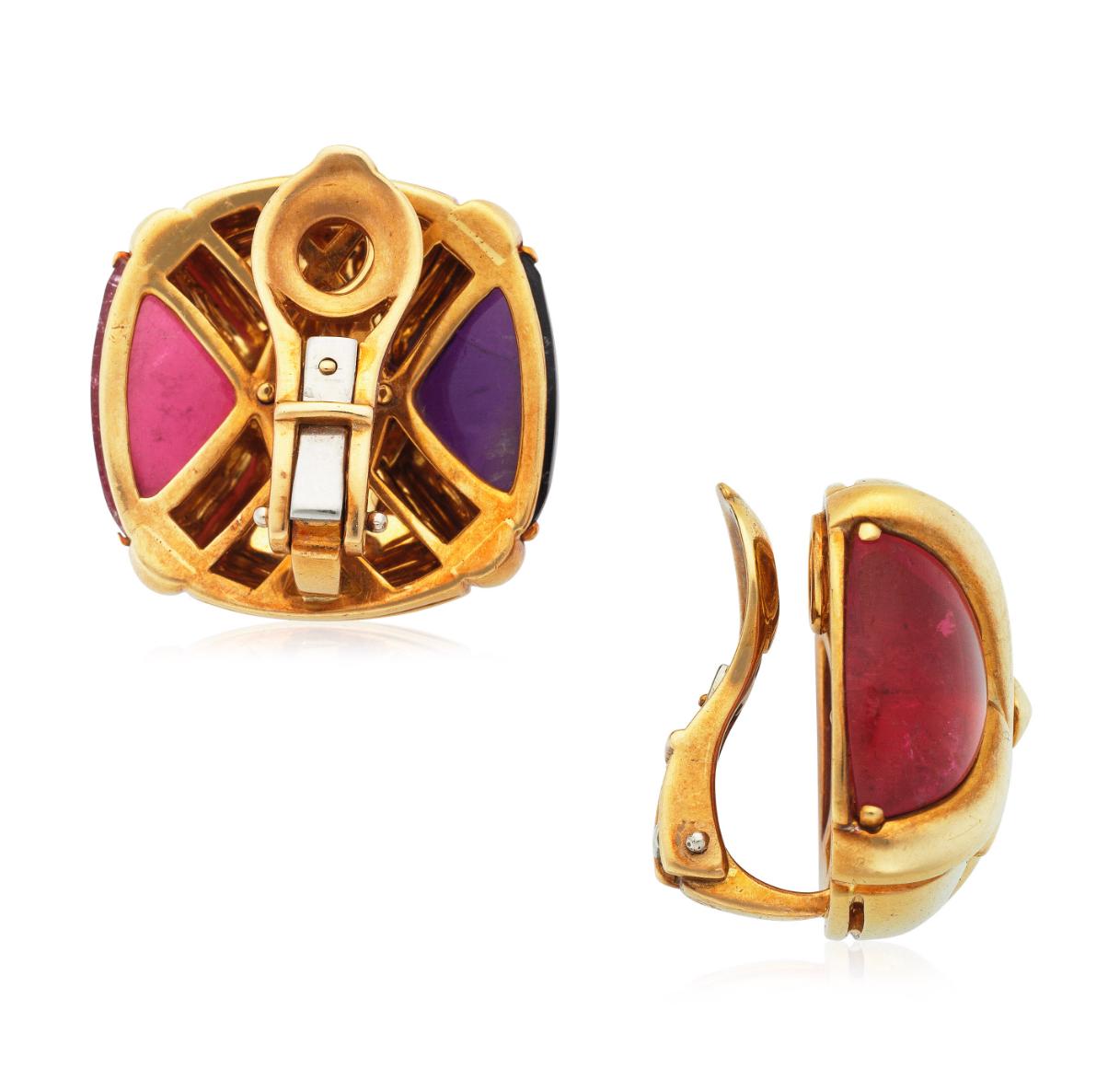 One pair of 18 karat yellow gold earrings featuring two fine quality cabochon Amethysts and Tourmalines measuring 2.1 x 2.1 cm.  The earrings have clip backs weighing in total 31.5 grams.  They are marked 750 and numbered 1990.