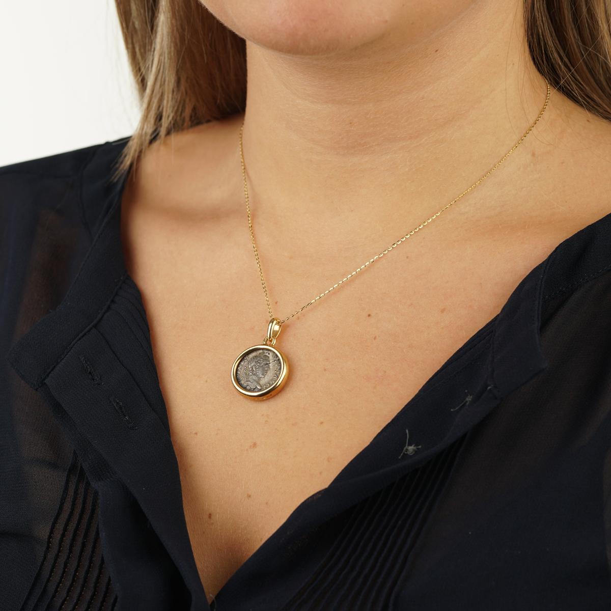 An amazing find from Bulgari showcasing an ancient coin from AD198-217 encased in an 18k yellow gold bezel.

The necklace is not included and is for illustration purposes only.