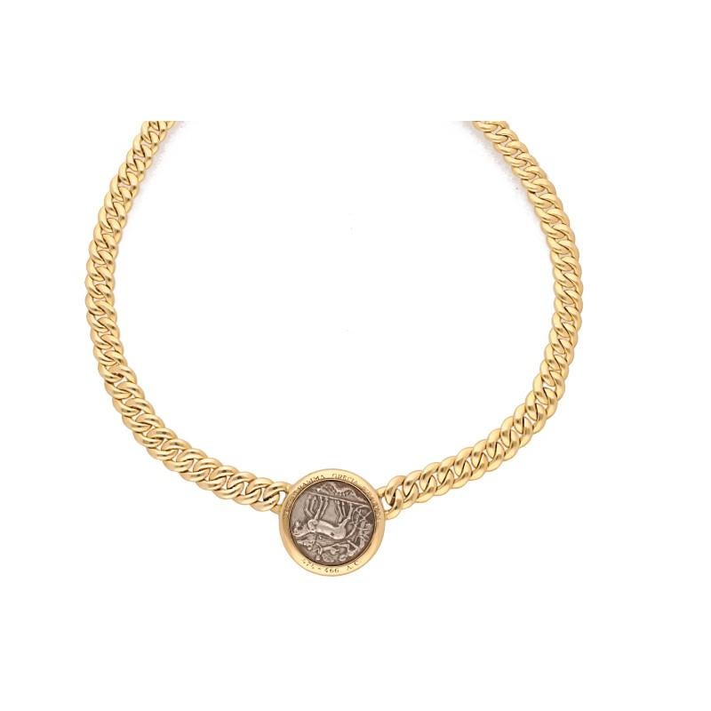 18 kt. yellow gold link necklace featuring an ancient roman coin in the center, crafted by Bulgari for Monete Collection.
Pendant coin is 2.90 cm. in diameter. 
474 - 466 A.D.