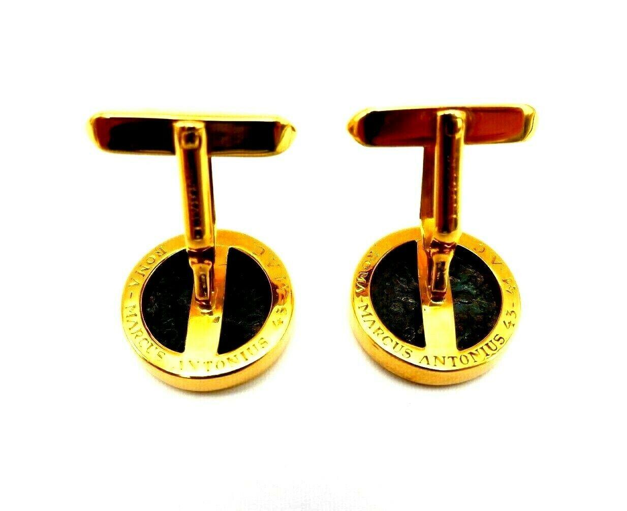 A pair of vintage cufflinks by Bulgari made of 18k yellow gold featuring ancient Roman coin. Stamped with 