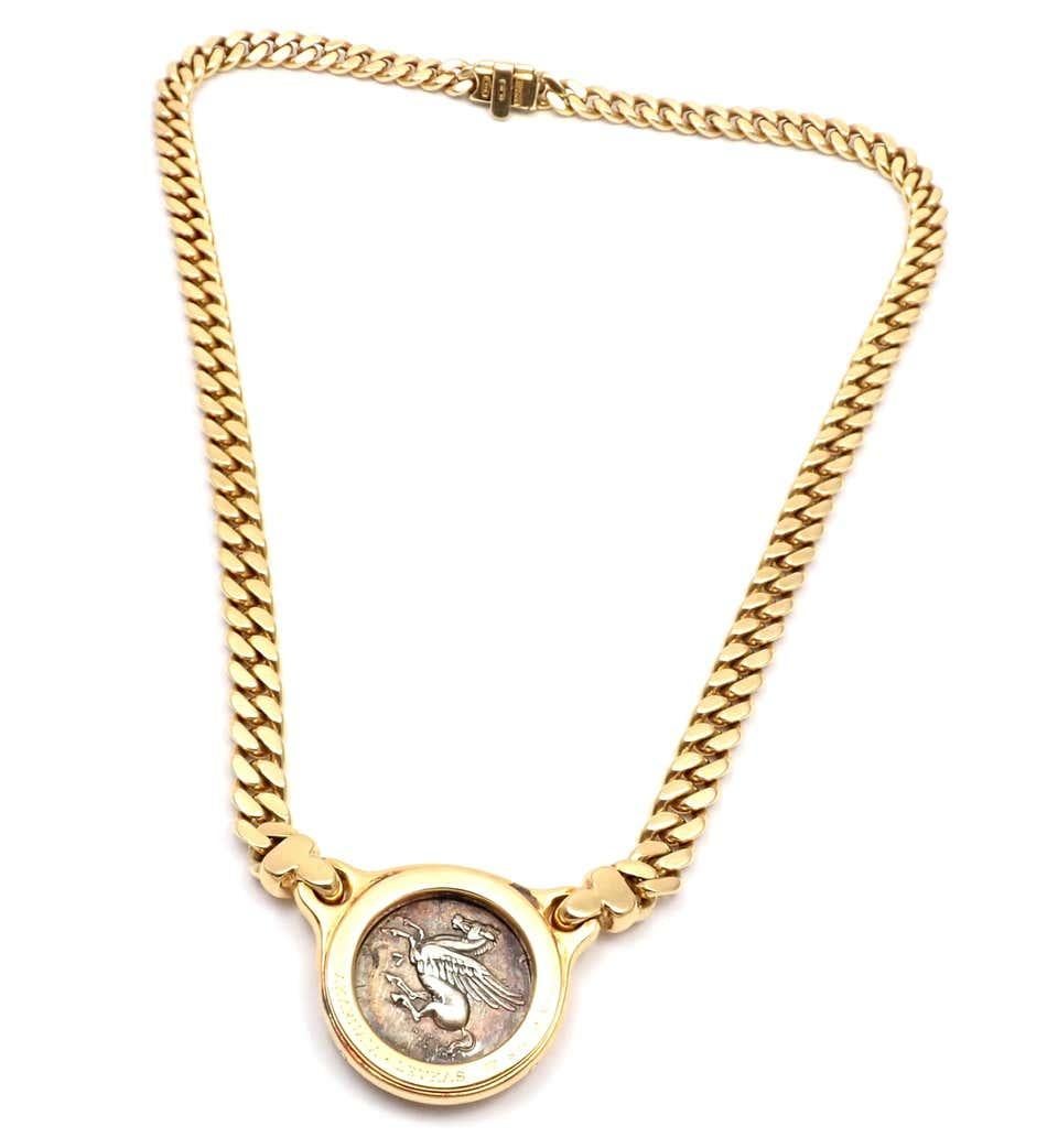 18k yellow gold ancient silver coin, link chain necklace by Bulgari.
Measurements: 
Length: 15.5