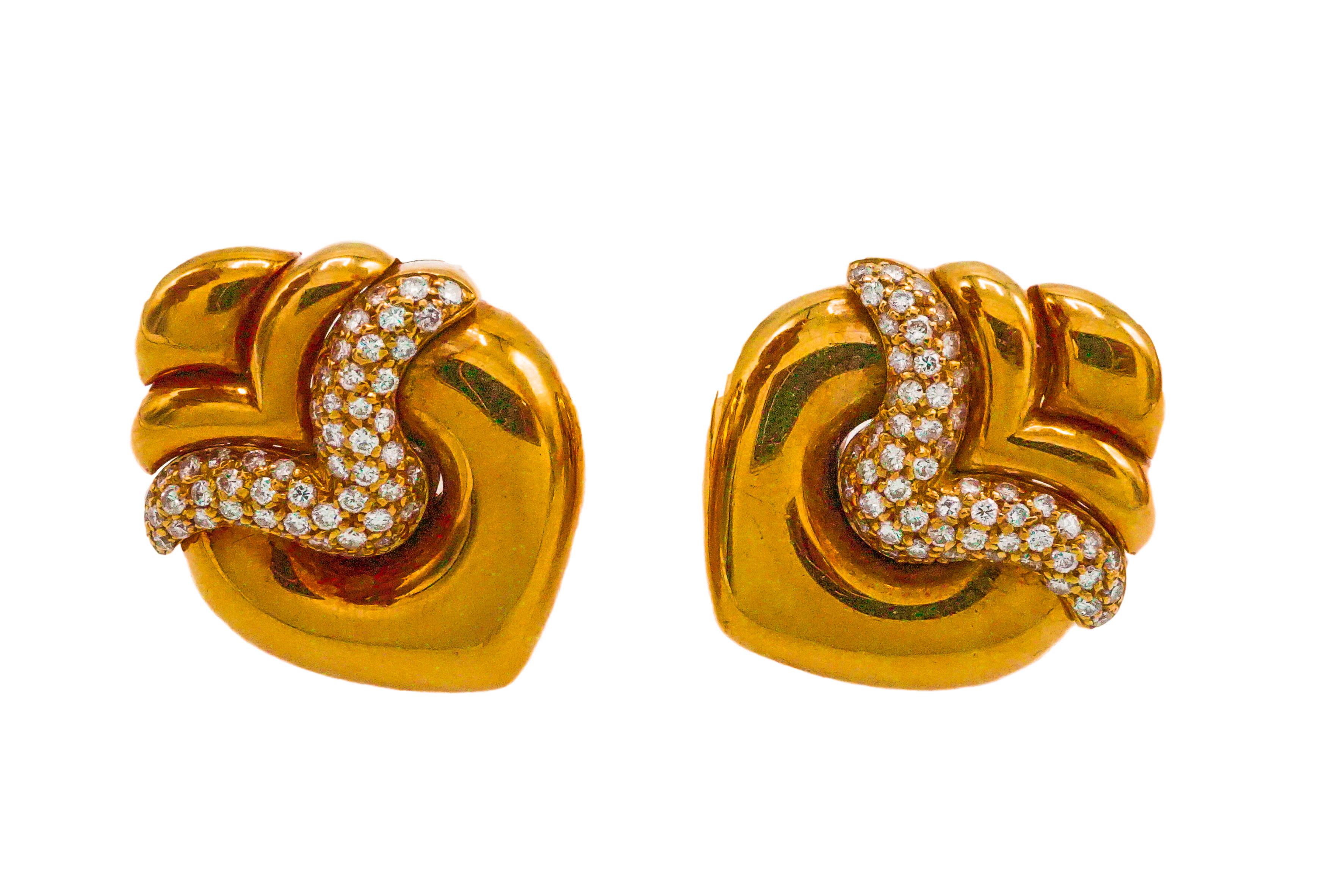 BULGARI GOLD AND DIAMOND EARRINGS
Each sculpted and polished gold earring with round diamond accents

Metal: 18k yellow gold
Diamonds: 110 round diamonds with approximate total weight of 1.45 - 1.65 carats
Signature: BULGARI
Marks: 750,