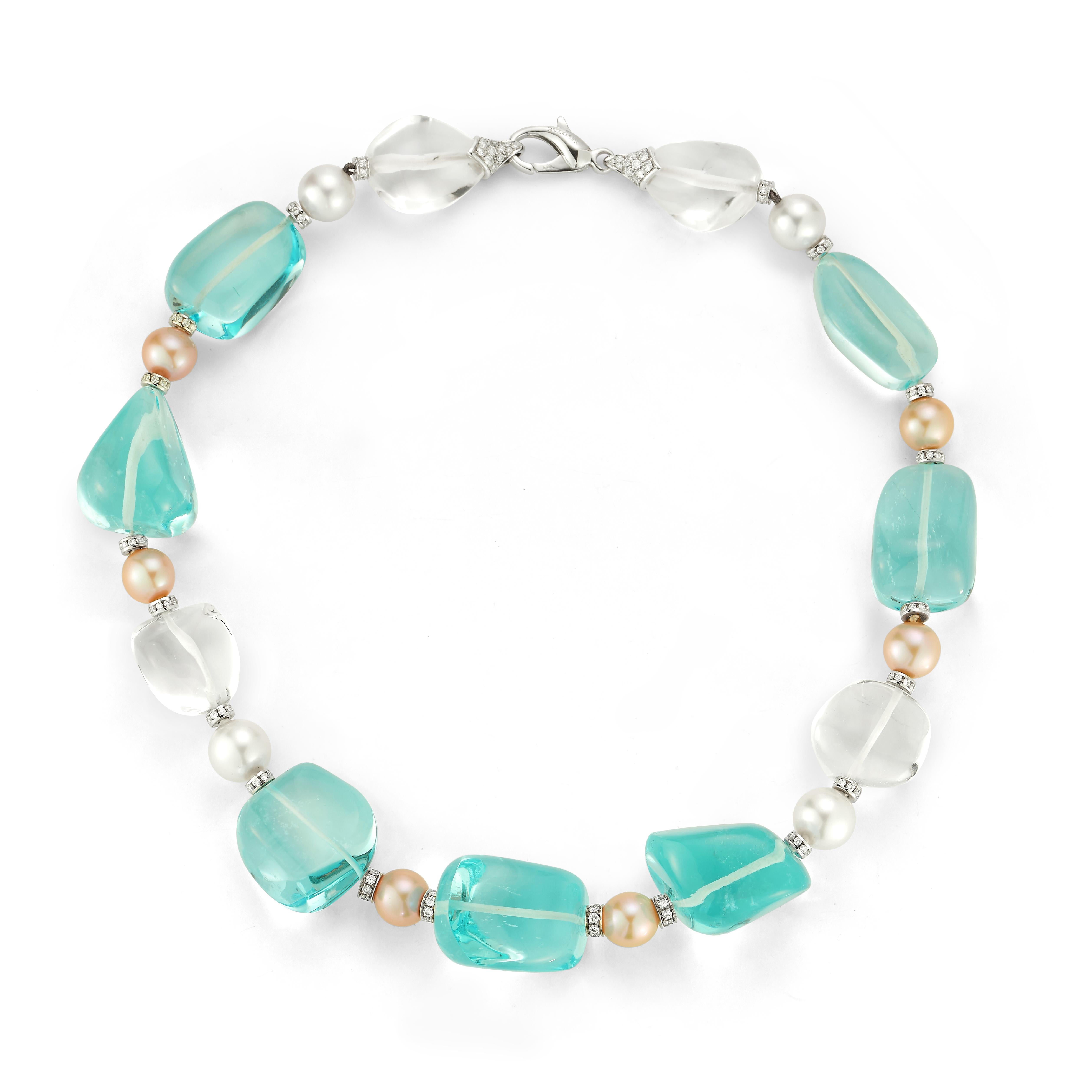 Bvlgari Aquamarine Rock Crystal & Pearl Necklace

A necklace featuring large aquamarine beads, rock crystals beads, and pink and white pearls. 

Set with pave diamond spacers

Measurements: 18