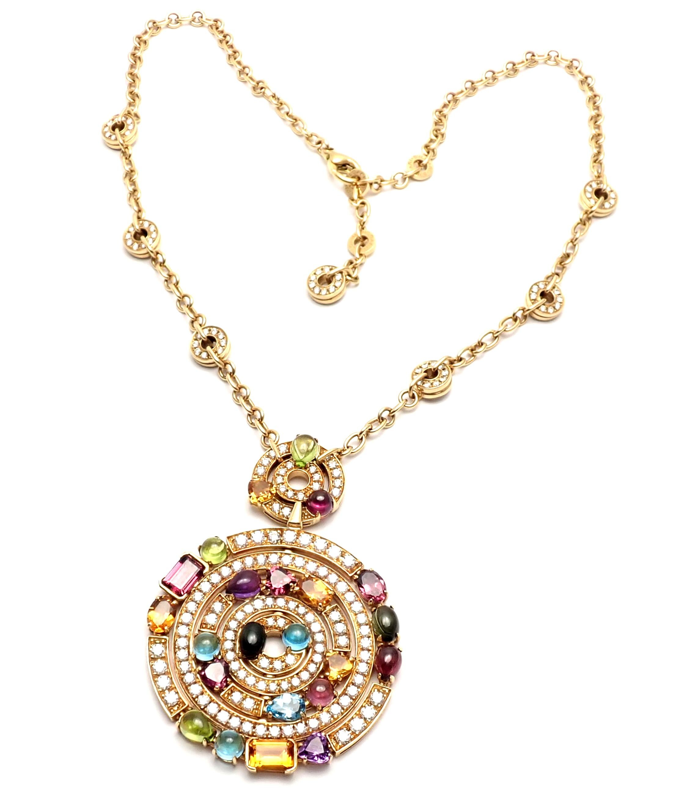 18k Yellow Gold Diamond Color Stone Astrale Large Pendant Necklace by Bulgari.  
With 171 round brilliant cut diamonds VVS1 clarity E color total weight approx. 5ct
Blue Topazes, Amethysts, Green Tourmalines, Peridots, Citrine Quartz, Rhodolite