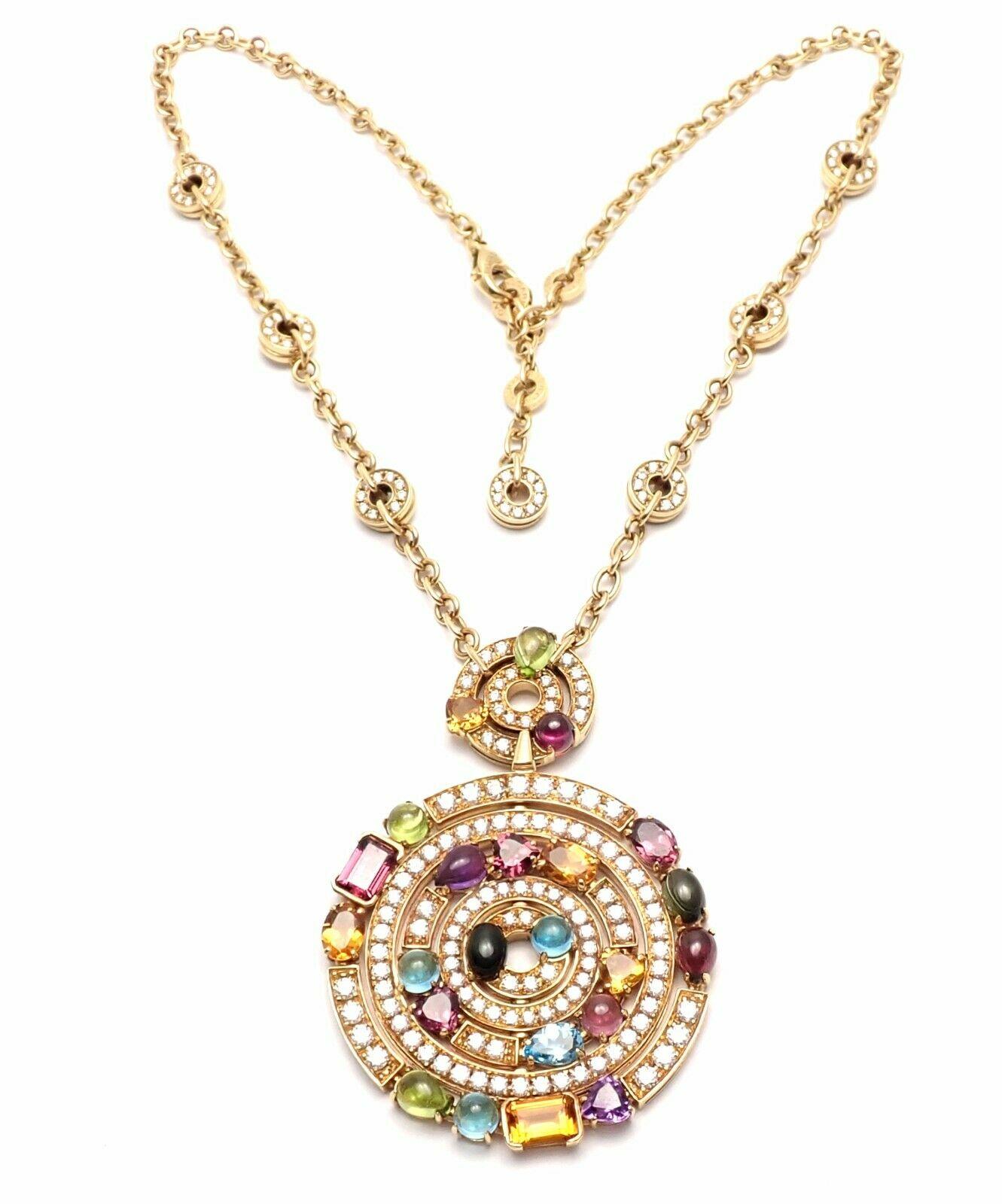 18k Yellow Gold Diamond Color Stone Astrale Large Pendant Necklace by Bulgari.  
With 171 round brilliant cut diamonds VVS1 clarity E color total weight approx. 5ct
Blue Topazes, Amethysts, Green Tourmalines, Peridots, Citrine Quartz, Rhodolite