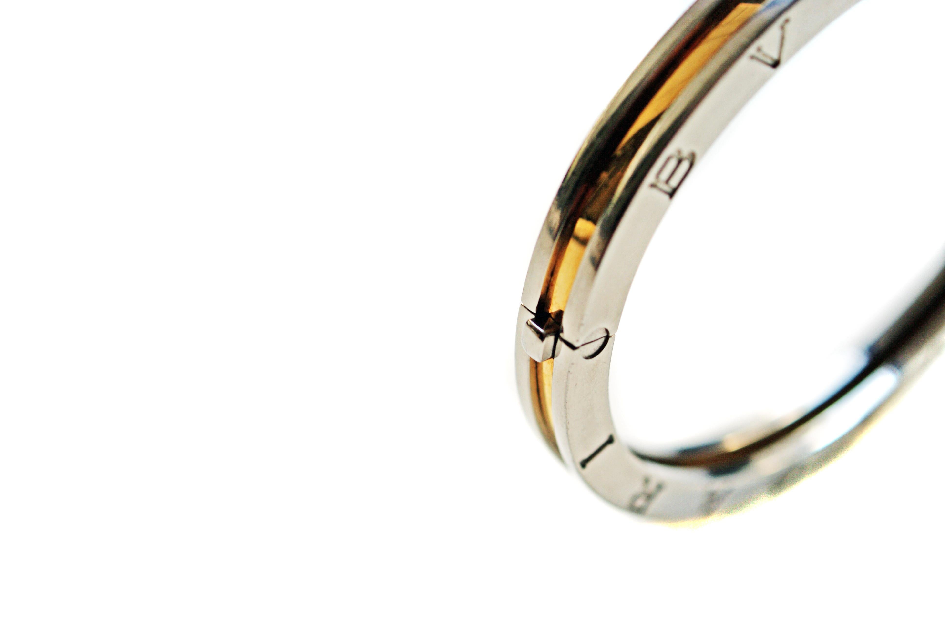 Contemporary Bulgari B Zero-1 18 Karat Yellow Gold and Stainless Steel Oval Bangle Bracelet