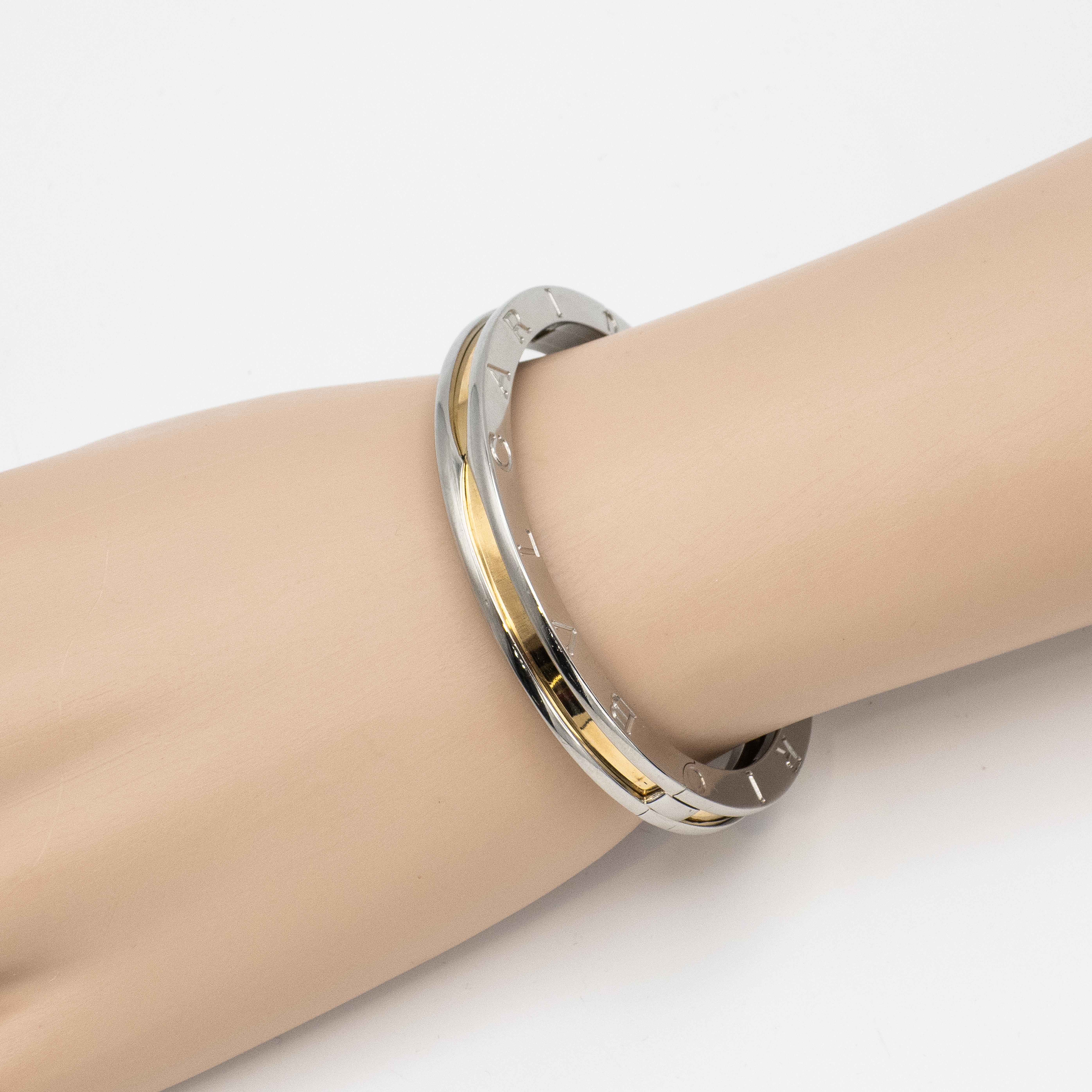 Modern BULGARI B. Zero 1 18K YG and Steel Oval Hinged Bangle For Sale
