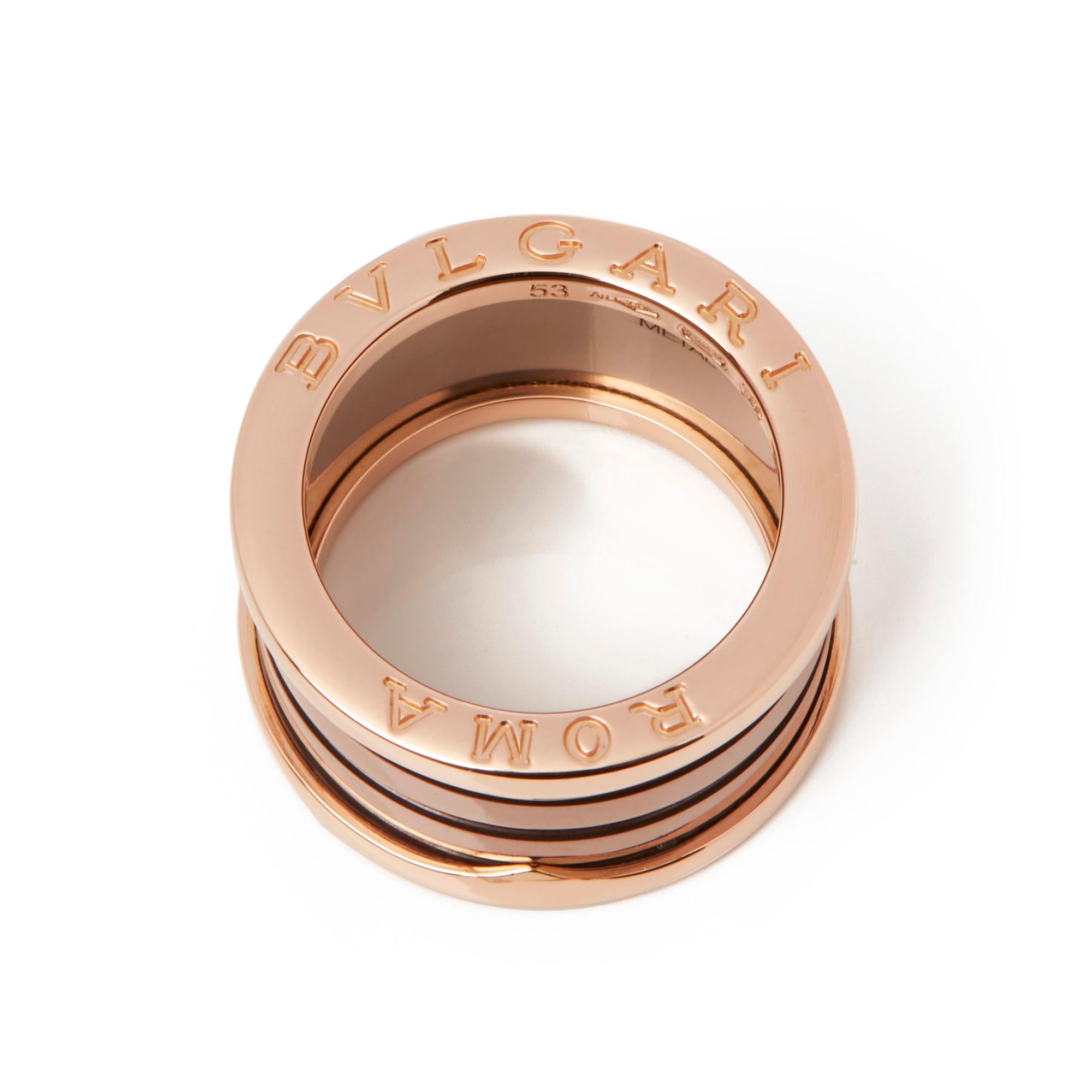 This ring by Bulgari is from their BZero1 Roma collection and features a distinctive four band spiral of bronze ceramic set within an 18ct rose gold band. UK Ring Size M 1/2, EU size 53, US size 6 1/4. Complete with a Xupes presentation box. Our