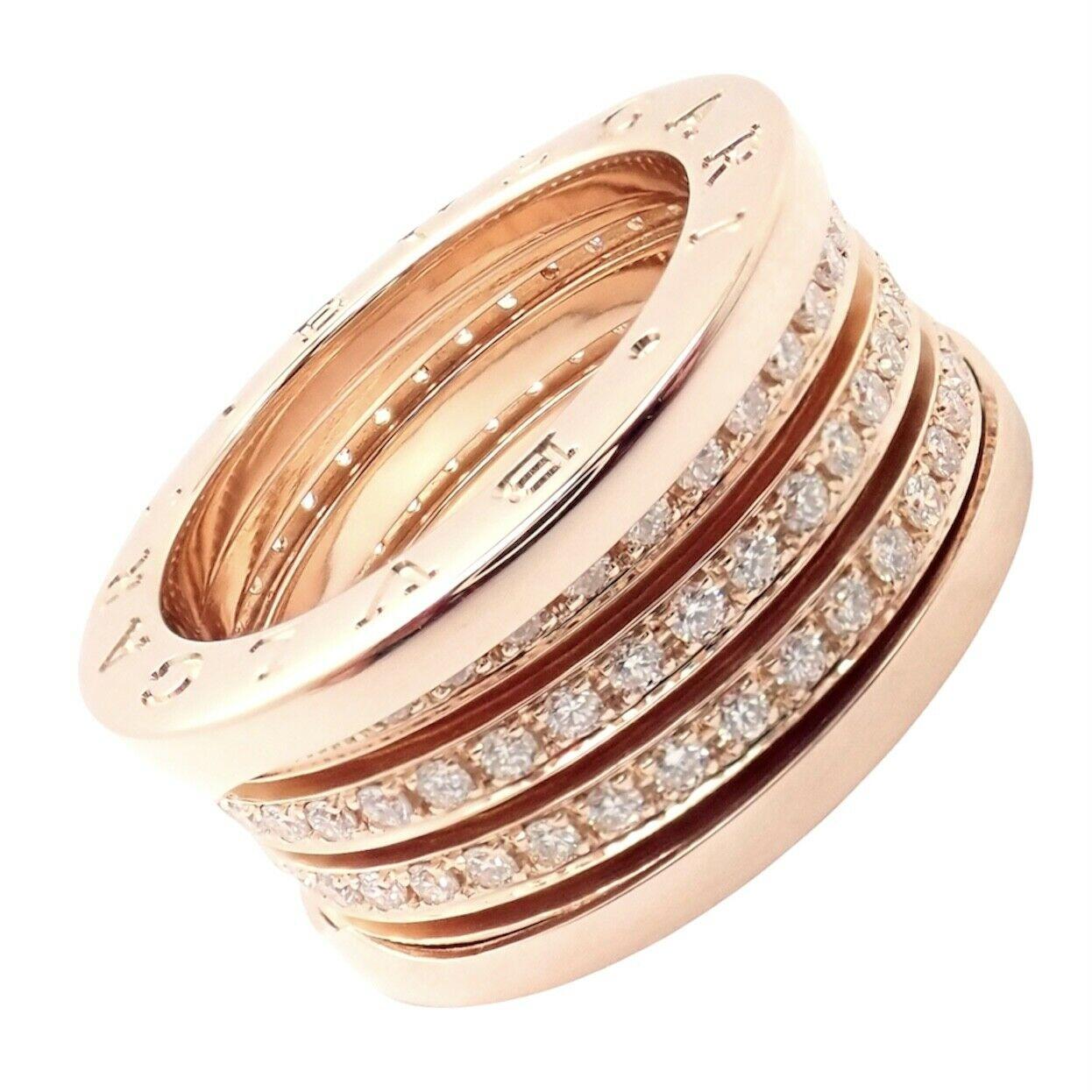 18k Rose Gold Pave Diamond B-Zero Three Band Ring by Bulgari. 
With Round brilliant cut diamonds VVS1 clarity, E color
Details:
Size: European 54, US 6.75
Weight: 15 grams
Width: 10mm
Stamped Hallmarks: Bvlgari 750 Made in Italy 54
*Free Shipping
