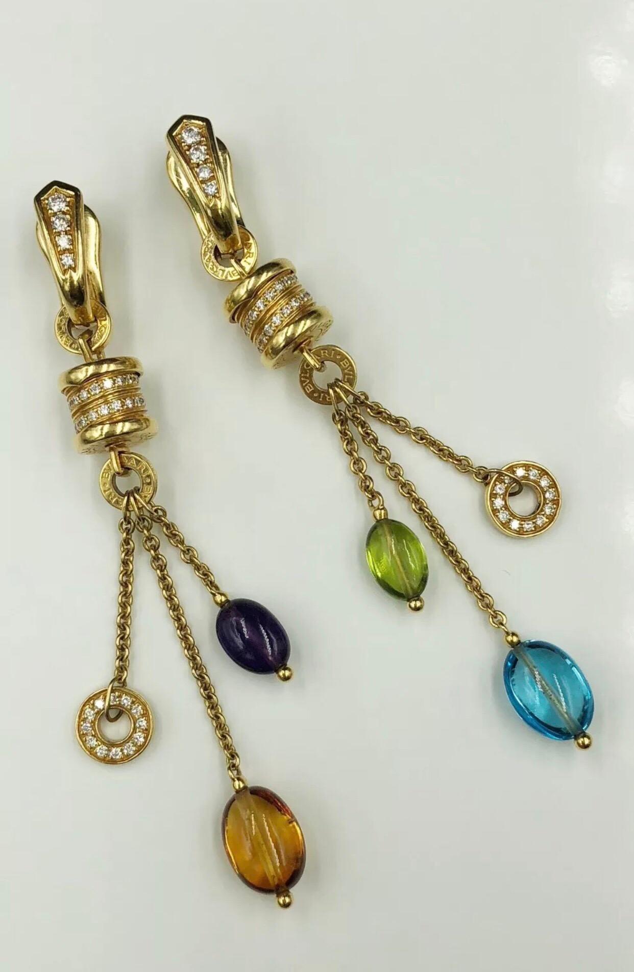 Bulgari B. Zero1 gemstone & diamond dangle earrings set in 18K Yellow Gold. 0.44 CTW in diamonds, topaz, citrine, peridot and tourmaline gemstones.