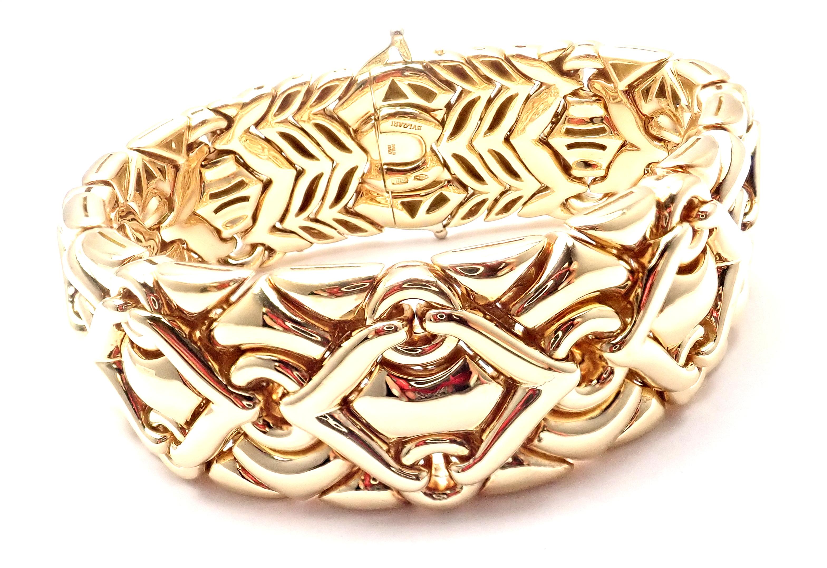 18k Yellow Gold Wide Link Trika Bracelet by Bulgari. 
Details: 
Length: 7