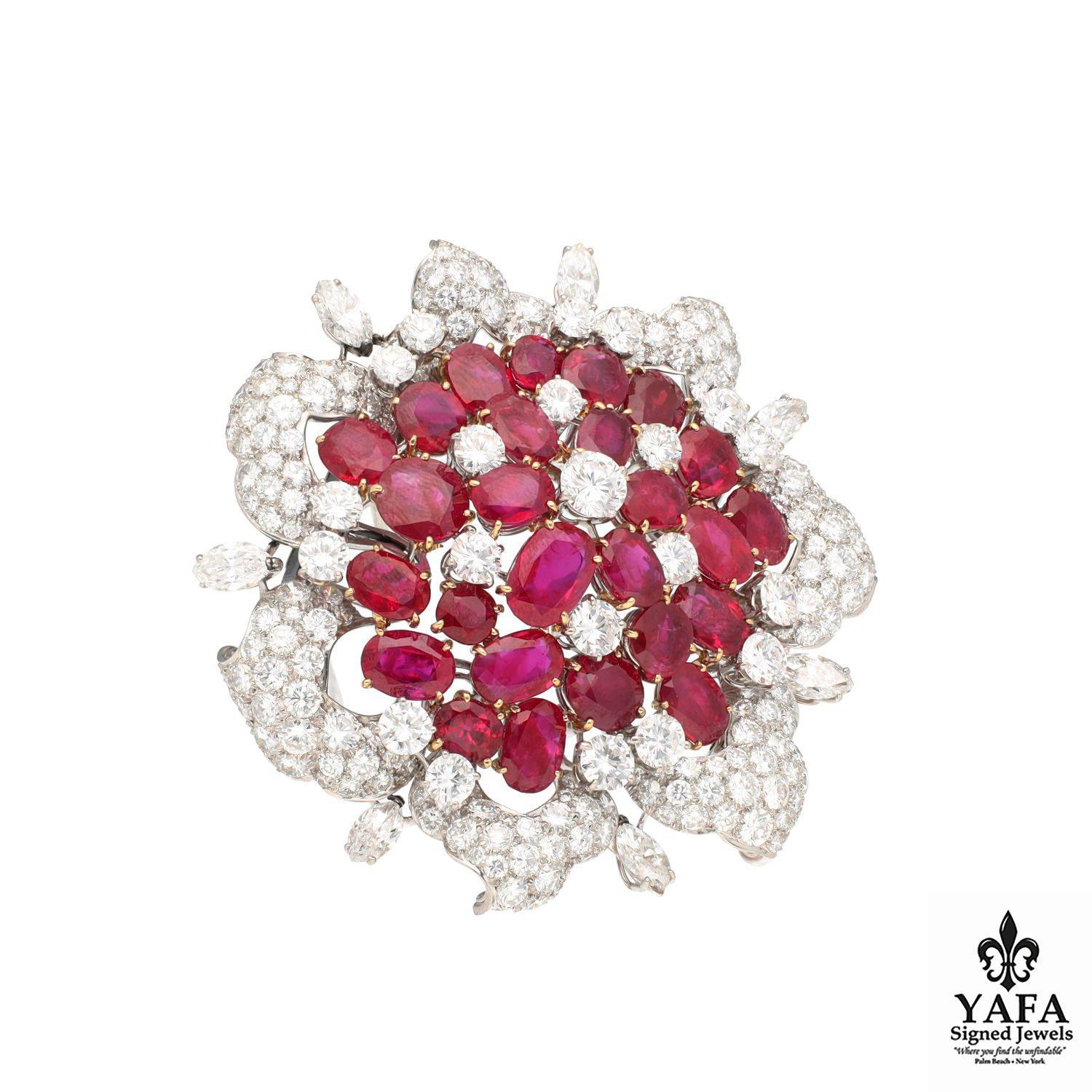 BULAGRI Burmese No-Heat Ruby and White Diamond Brooch Circa 1960's.
25 Rubies - Roundish and Oval Cut to Antique Cushion, Brilliant / Step Cut.
Total Ruby Weight Approximately - 25 CTS. Ranging from Approximately 1.4 CTS to 0.60 CTS.
7 Marquis White