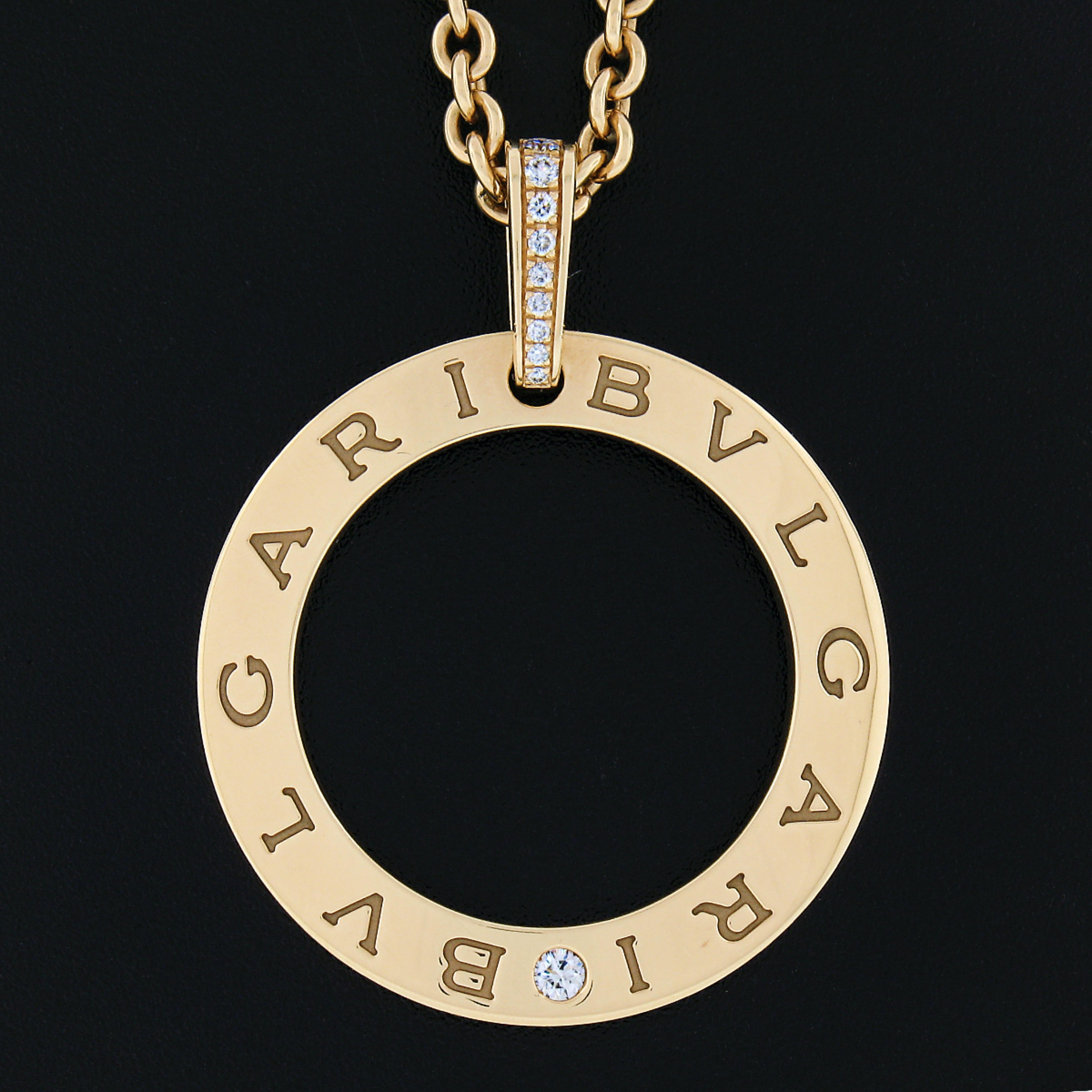 Hier haben wir eine wunderschöne, 100% authentisch, Bulagri Aussage Anhänger Halskette aus massivem 18k Gelbgold gefertigt. Der Anhänger besteht aus einem wellenförmigen, offenen Kreis, der mit einem runden Brillanten am unteren Ende und einem