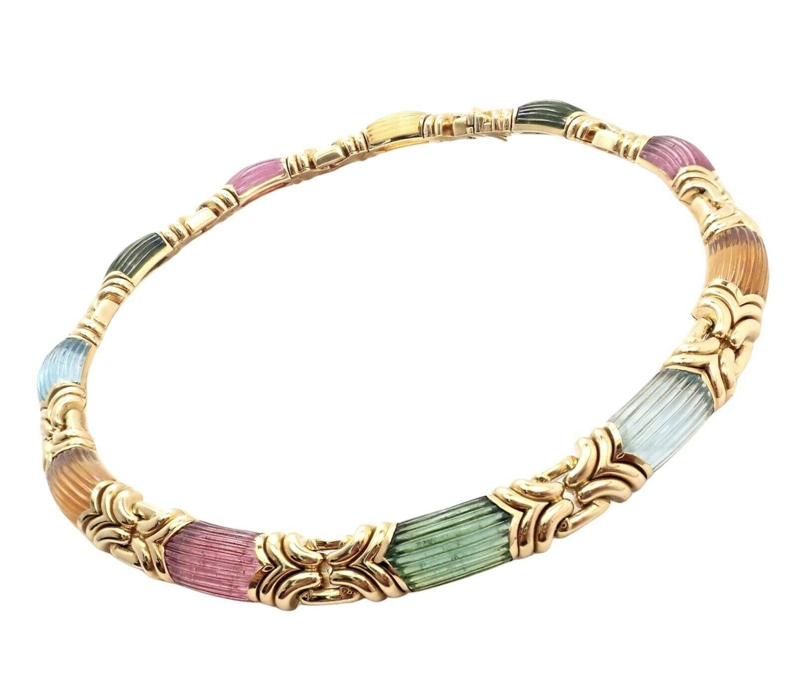 18k Yellow Gold Carved Tourmaline, Topaz, Citrine Stones Alveare Necklace by Bulgari. 
With 3x Carved Lemon Yellow Citrine
3x Carved Green Tourmaline
3x Carved Pink Tourmaline
2x Carved Blue Topaz
Each Stone is 10mm x 19mm
Details: 
Length: