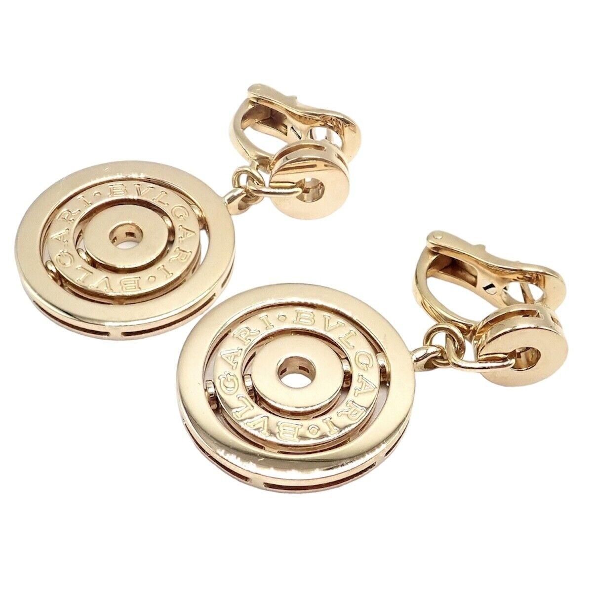 18k Yellow Astrale Cerchi Three Circle Drop Earrings by Bulgari.
These earrings are made for pierced ears.
Details:
Weight: 22.7 grams
Measurements: Main Circle: 21mm
Total Length: 34mm
Stamped Hallmarks: Bulgari Made in Italy 750 
*Free Shipping