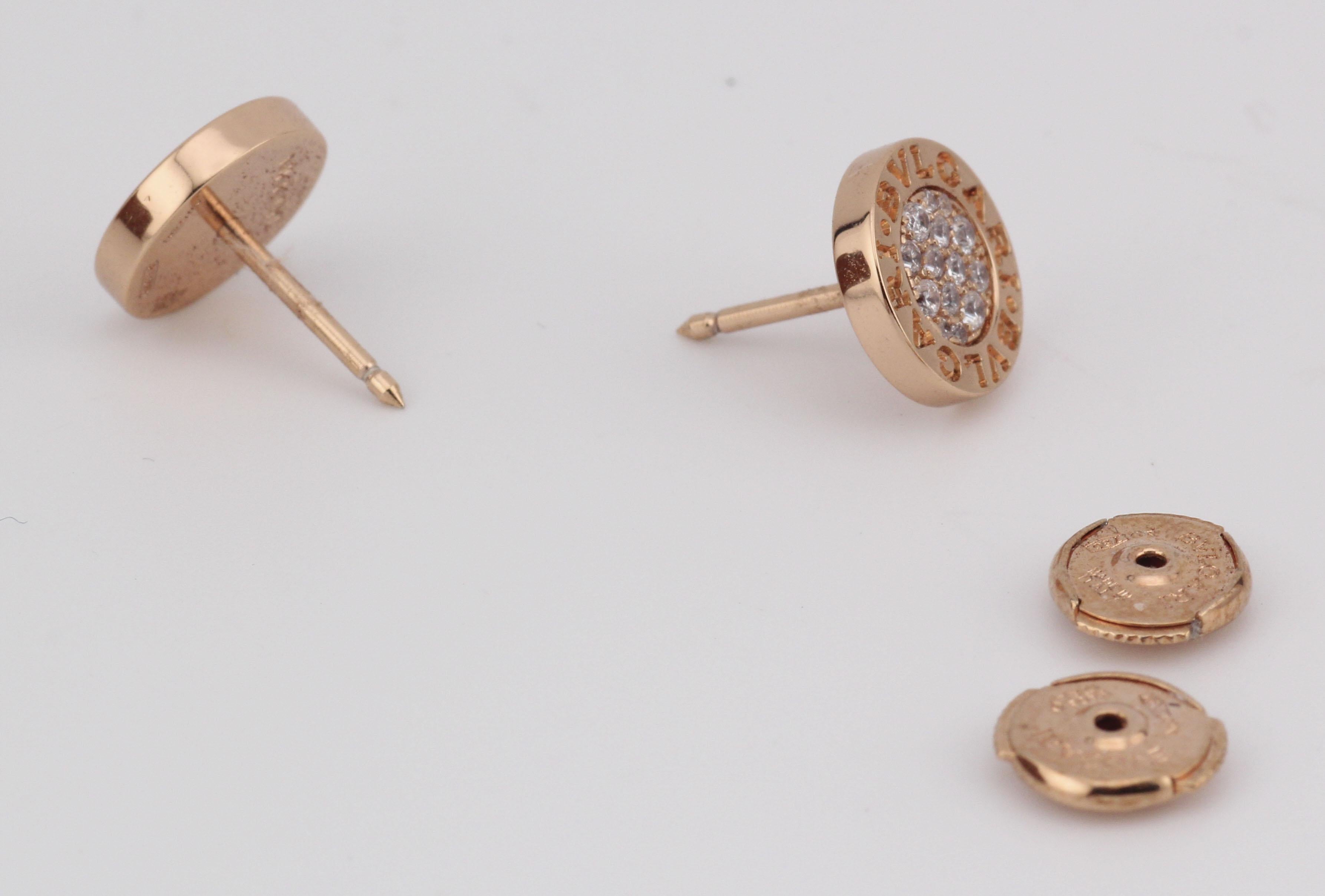 The Bvlgari Bvlgari Diamond 18k Rose Gold Stud Earrings are a stunning representation of the brand's luxurious design aesthetic, blending modern elegance with timeless sophistication. These earrings are crafted from 18k rose gold, giving them a