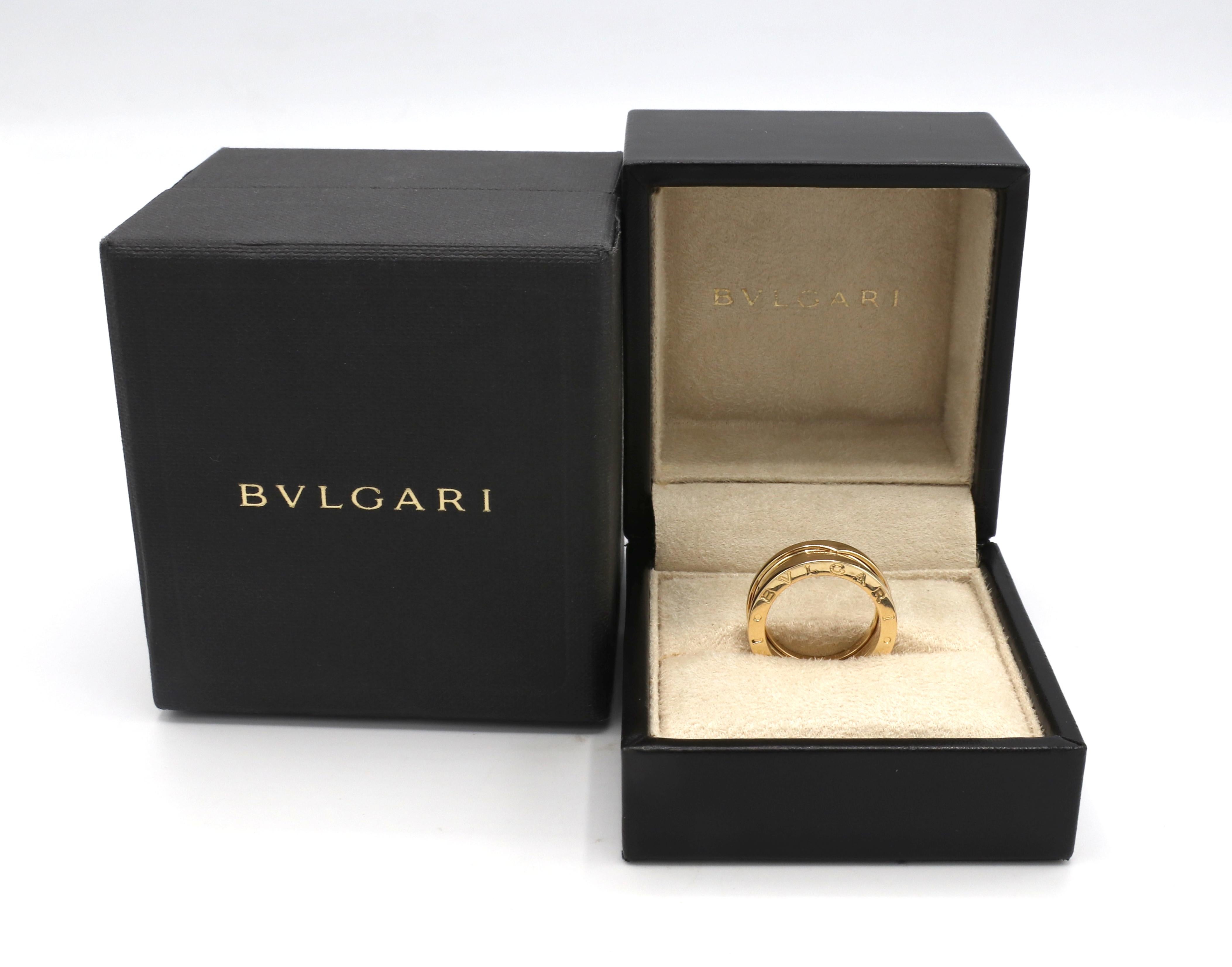 Bulgari B.Zero 1. 18 Karat Yellow Gold Three Band Ring 
Metal: 18k yellow gold
Weight: 9.92 grams
Size: 51 (5.75 US)
Width: 9mm (flexible)
Retail: $2720 USD
