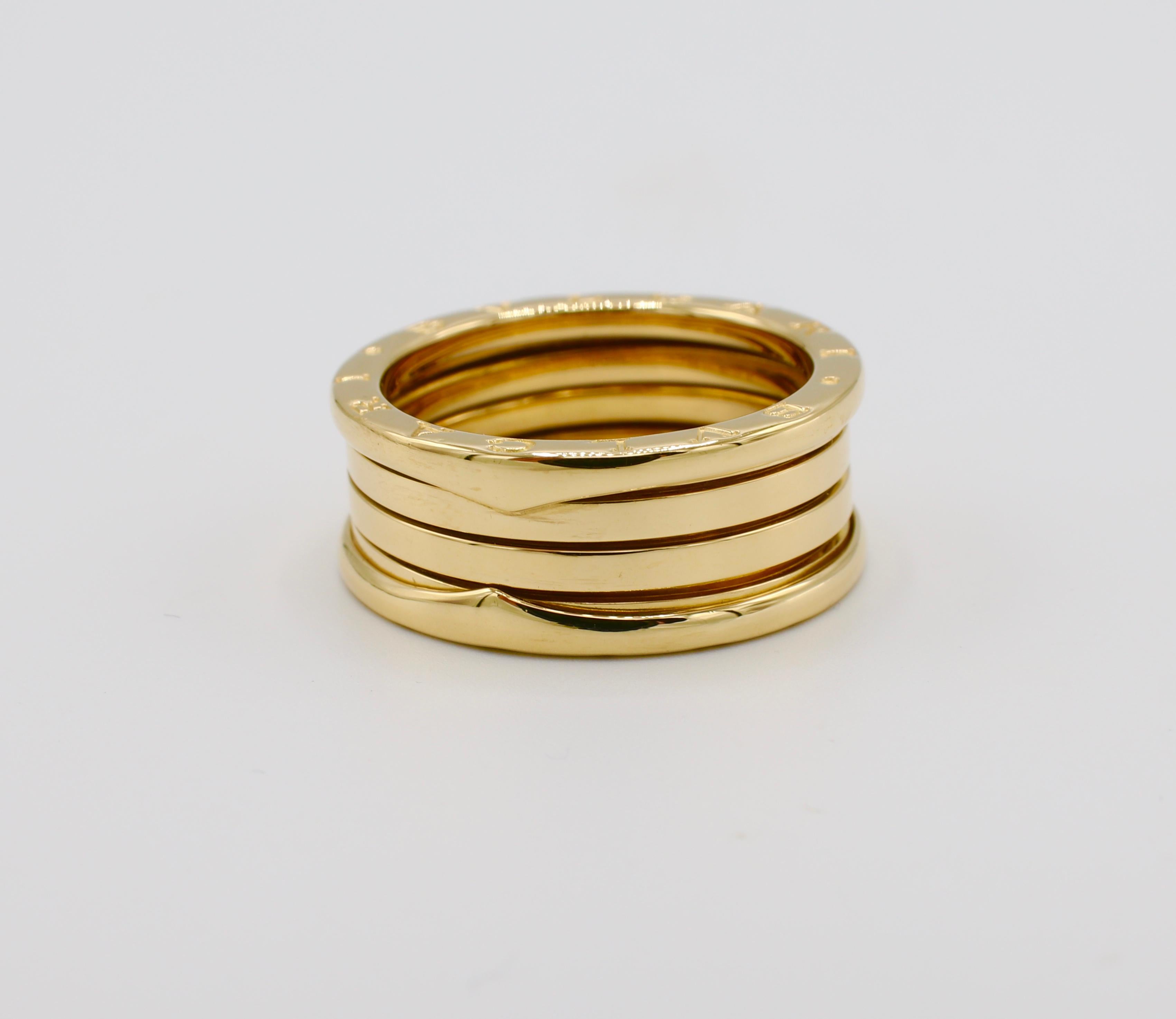 Bulgari Bvlgari B.Zero1 18K Yellow Gold 3 Band Ring Size 65 

Metal: 18k yellow gold
Weight: 12.7 grams
Width: Approx. 9mm
Size: 65 (US 11)


