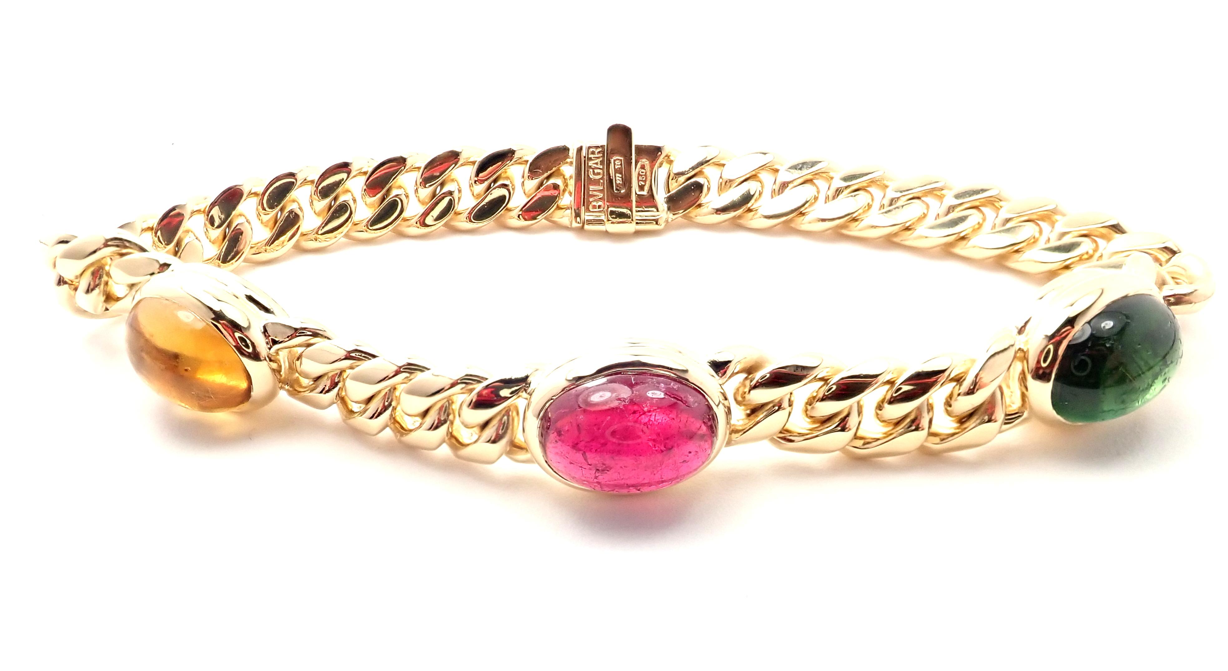 18k Yellow Gold Emerald Ruby And Yellow Sapphire Link Bracelet by Bulgari. 
With 1 oval ruby 10mm x 13mm approximately 3.5ct
1 oval emerald 10mm x 13mm approximately 3.5ct
1 oval yellow sapphire 10mm x 13mm approximately 3.5ct
Details: 
Weight: 37.1
