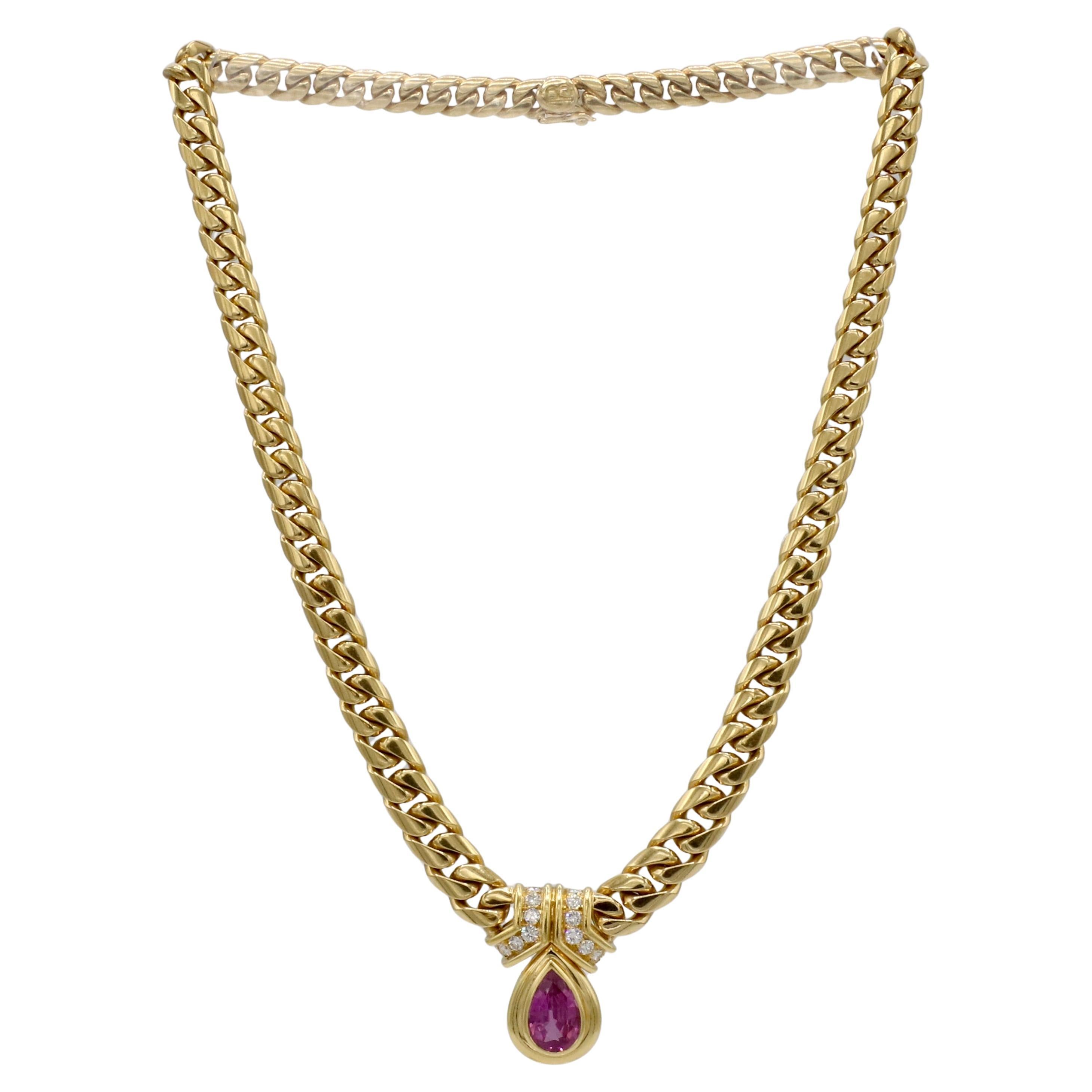 Bulgari Bvlgari 18K Yellow Gold Natural Pink Sapphire & Diamond Curb Link Chain Drop Necklace Circa 1990
Metal: 18k yellow gold
Weight: 74.55 grams
Pink Sapphire: 3.28 carats
Diamonds: 0.60 round natural diamonds D-F VVS
Length: 15 inches
Drop: 1