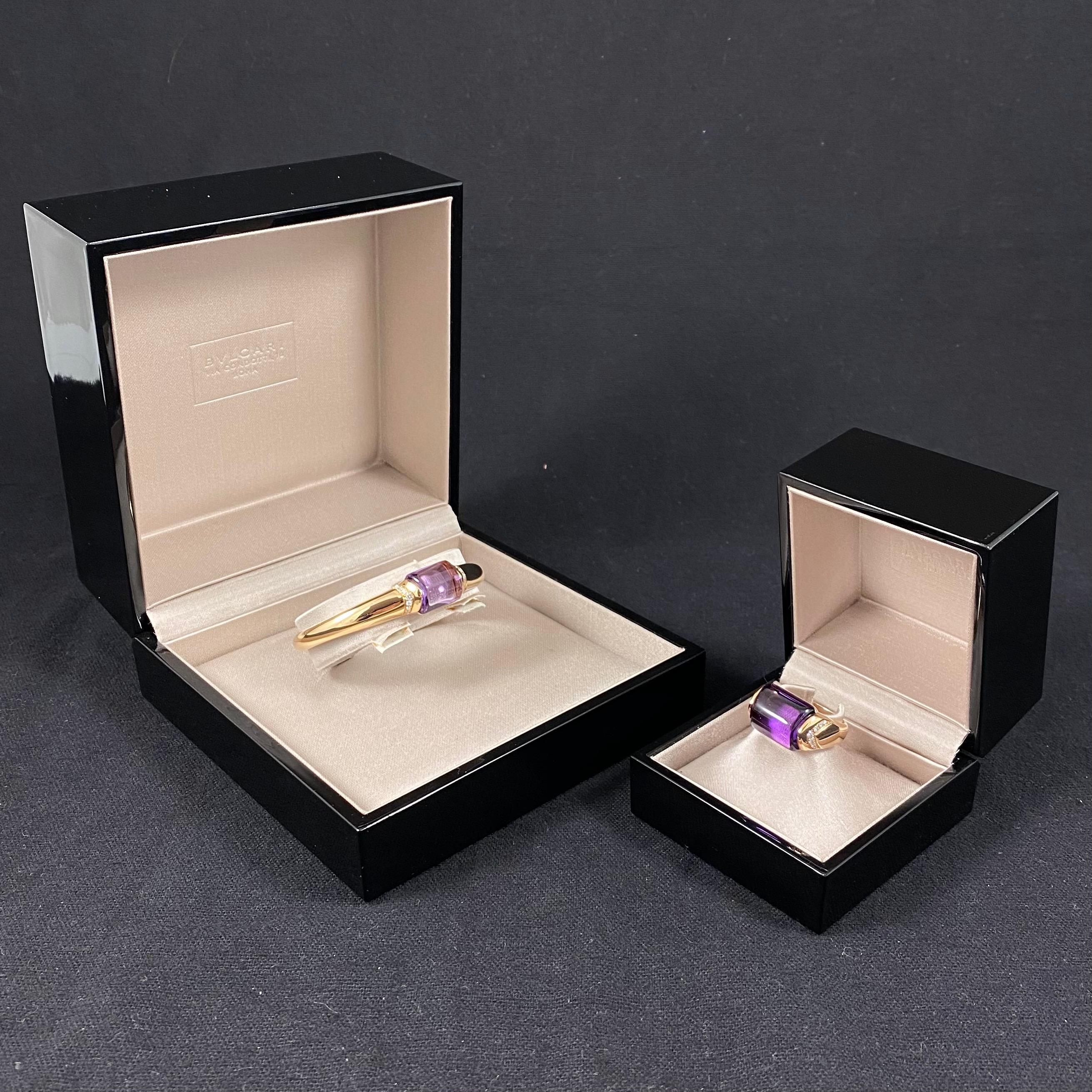 Bulgari/Bvlgari 'MVSA' amethyst and diamond jewelry set composed of a ring and a cuff bangle bracelet in 18K rose gold, Italian, circa 2014, each with maker’s case. The ring of a domed design features a central takhti-cut vivid purple amethyst to