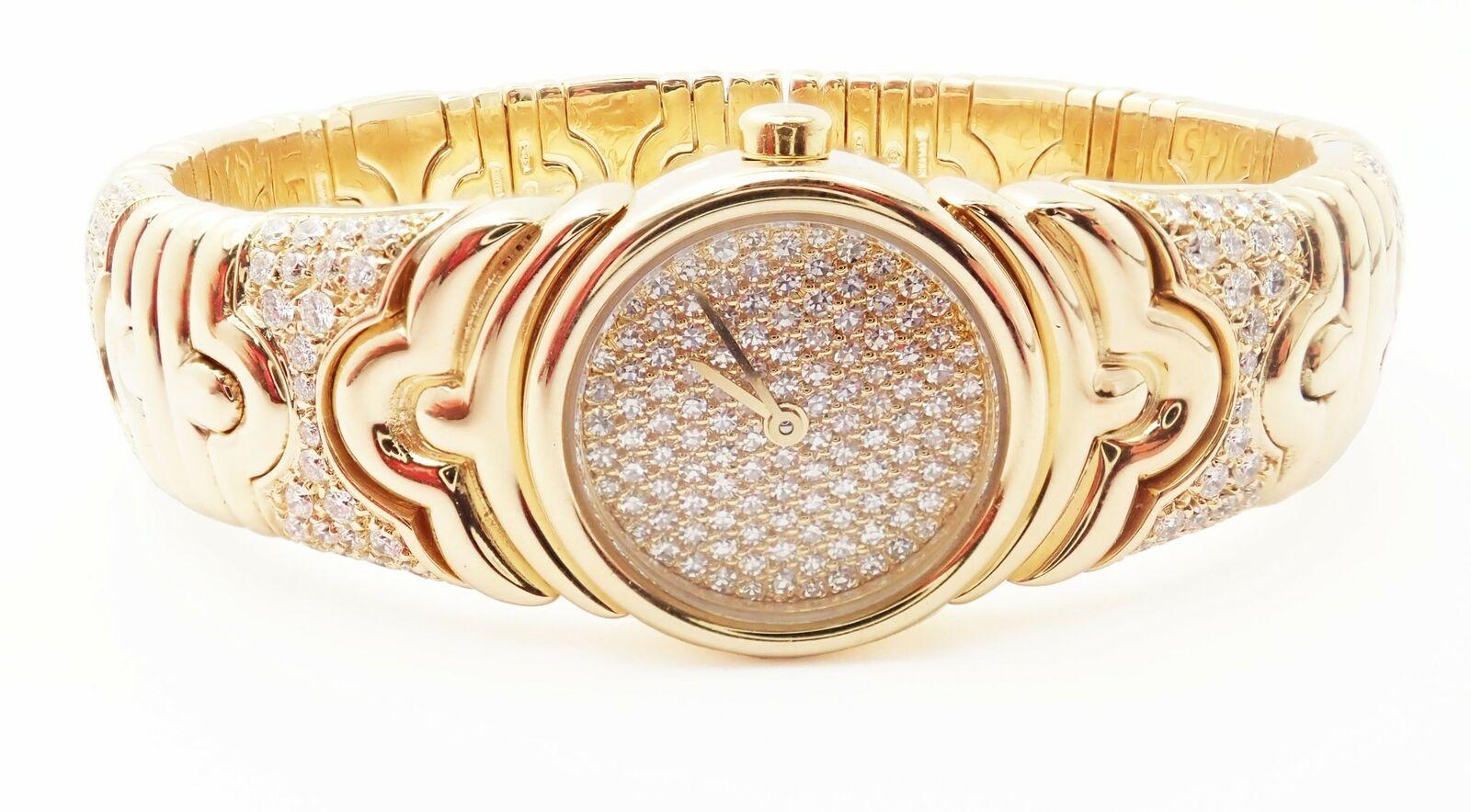 18k yellow gold diamond Parentesi bangle bracelet wristwatch by Bulgari. 
With Round brilliant cut diamonds VS1 clarity, G color total weight approximately 5.5 Carats Total Diamonds
Details:
Brand: Bulgari
Model: BJ 01
Case Dimensions: 20mm
Dial: