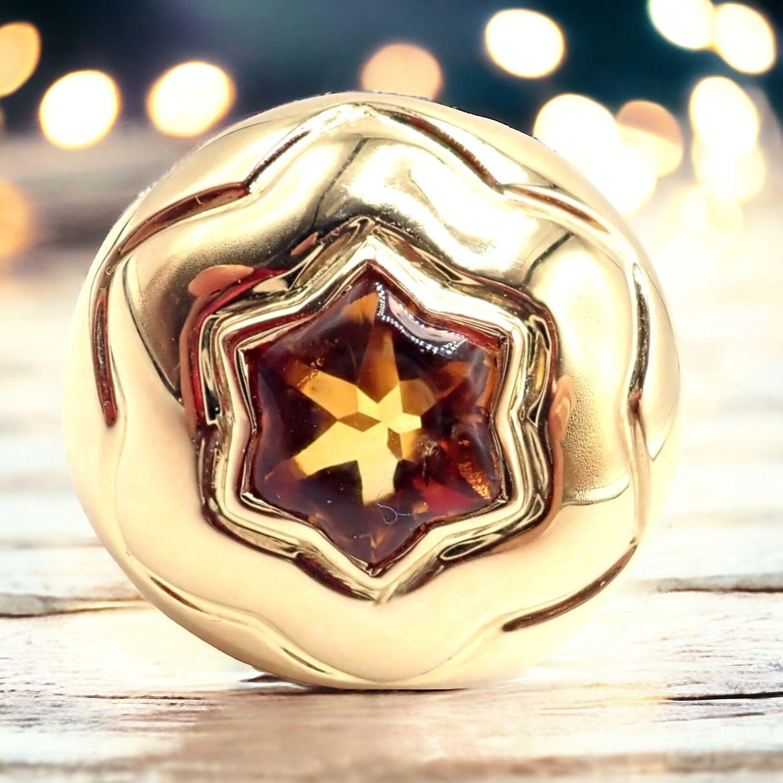 18k Yellow Gold Star Of David Shape Citrine Bombe Ring By Bulgari. 
The Bulgari Bvlgari 18k Yellow Gold Star of David Shape Citrine Bombe Ring is an exquisite piece of jewelry that combines deep cultural significance with luxurious design. 
Crafted