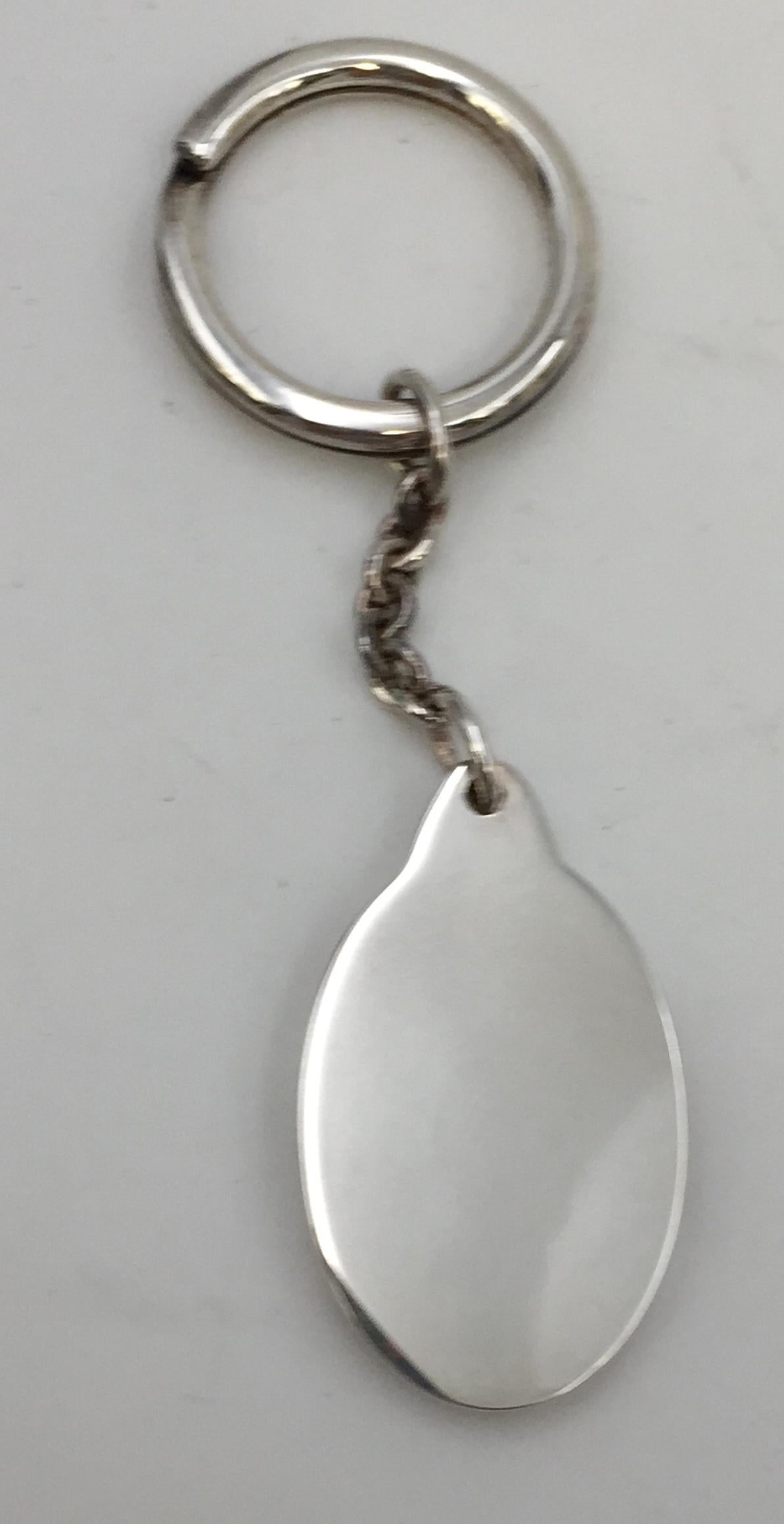 Bulgari sterling silver keychain, unique heavy gage silver. Accessorize in style with this classic piece. Beautiful gift for a new home, car, office, housewarming, birthday, Father's Day, Mother's Day, new job, graduation or retirement. Bearing