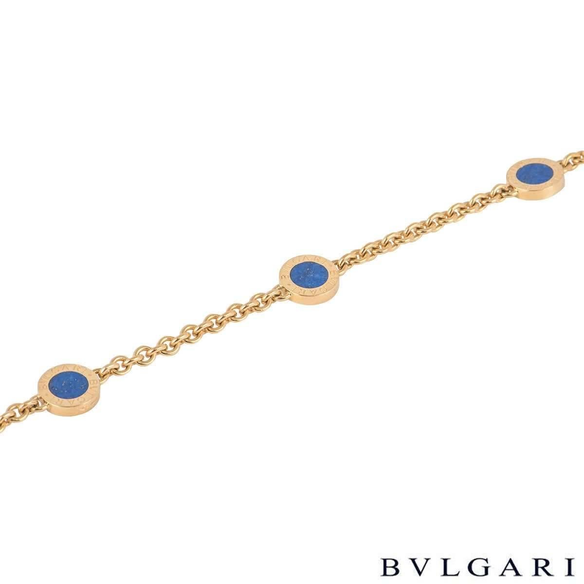 An 18k yellow gold bracelet from the Bulgari Bvlgari collection. The bracelet features 4 circular disks set with lapis lazuli to both sides. The bracelet measures 7.5 inches in length and has a gross weight of 13.36 grams.

The bracelet comes
