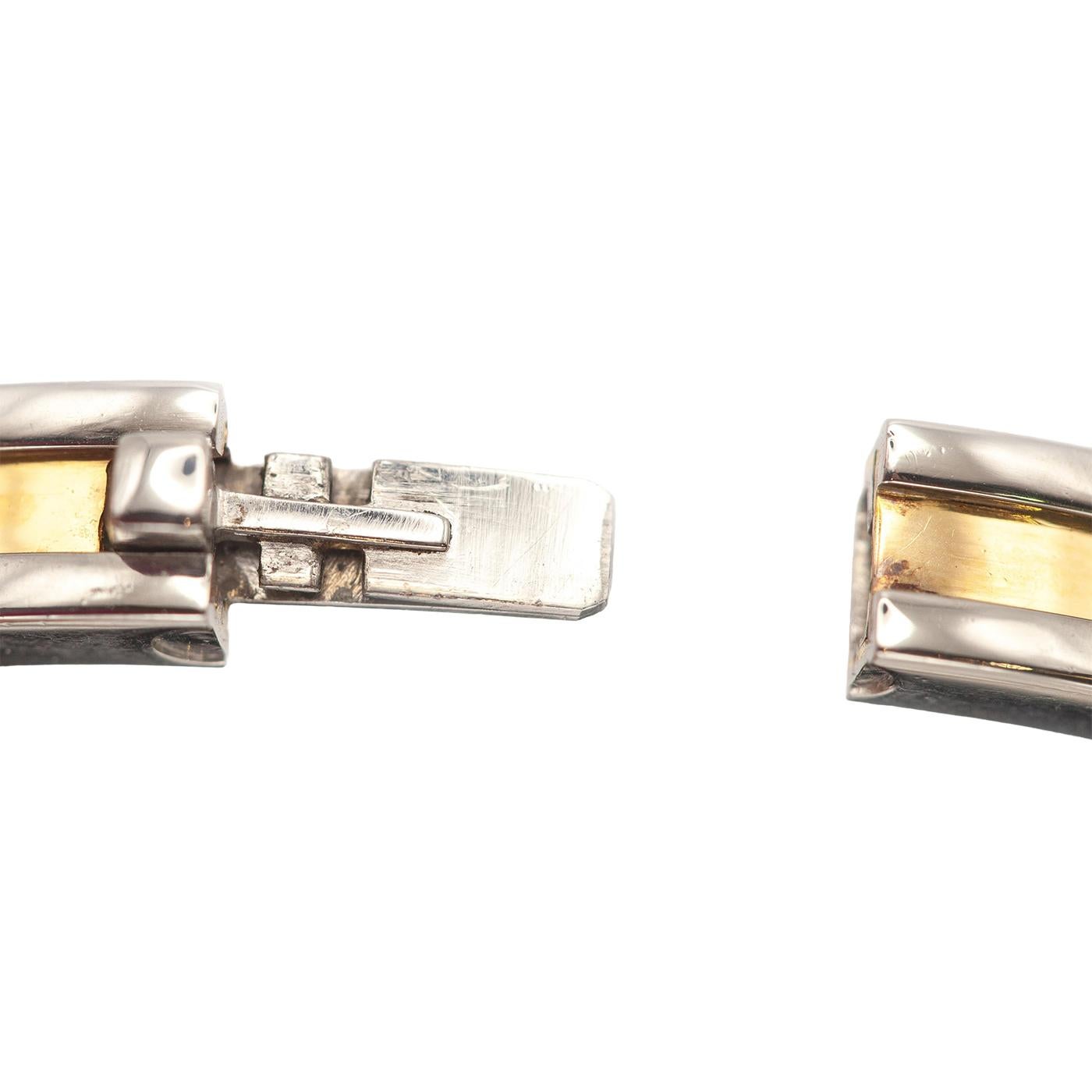 Bulgari B.zero1 Bracelet jonc à charnière ovale en or jaune 18 carats et acier inoxydable en vente 1