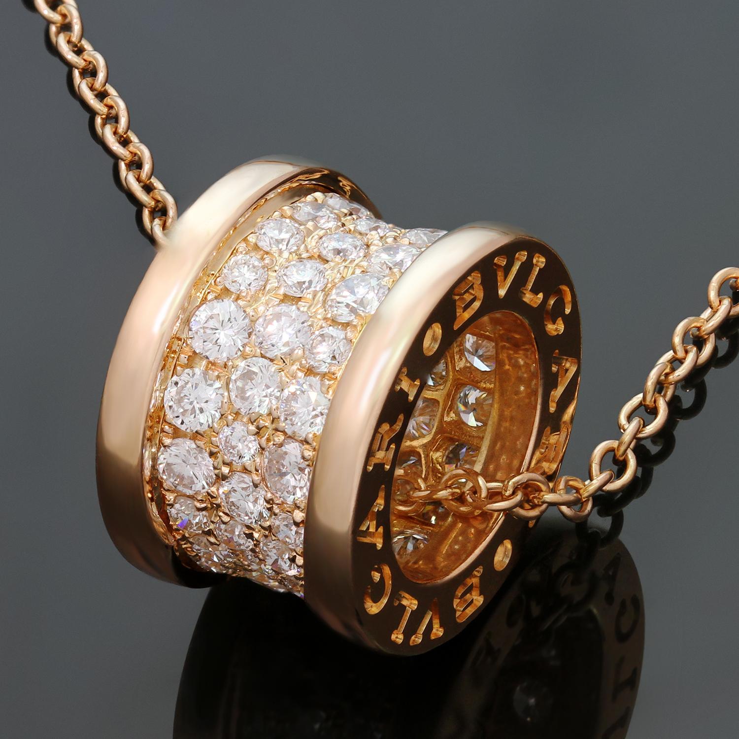 This gorgeous necklace from Bulgari's iconic B.zero1 collection is crafted 18k rose gold and completed with a BVLGARI inscribed band pendant pave-set with brilliant-cut round diamonds. Made in Italy circa 2010s. Measurements: 0.38