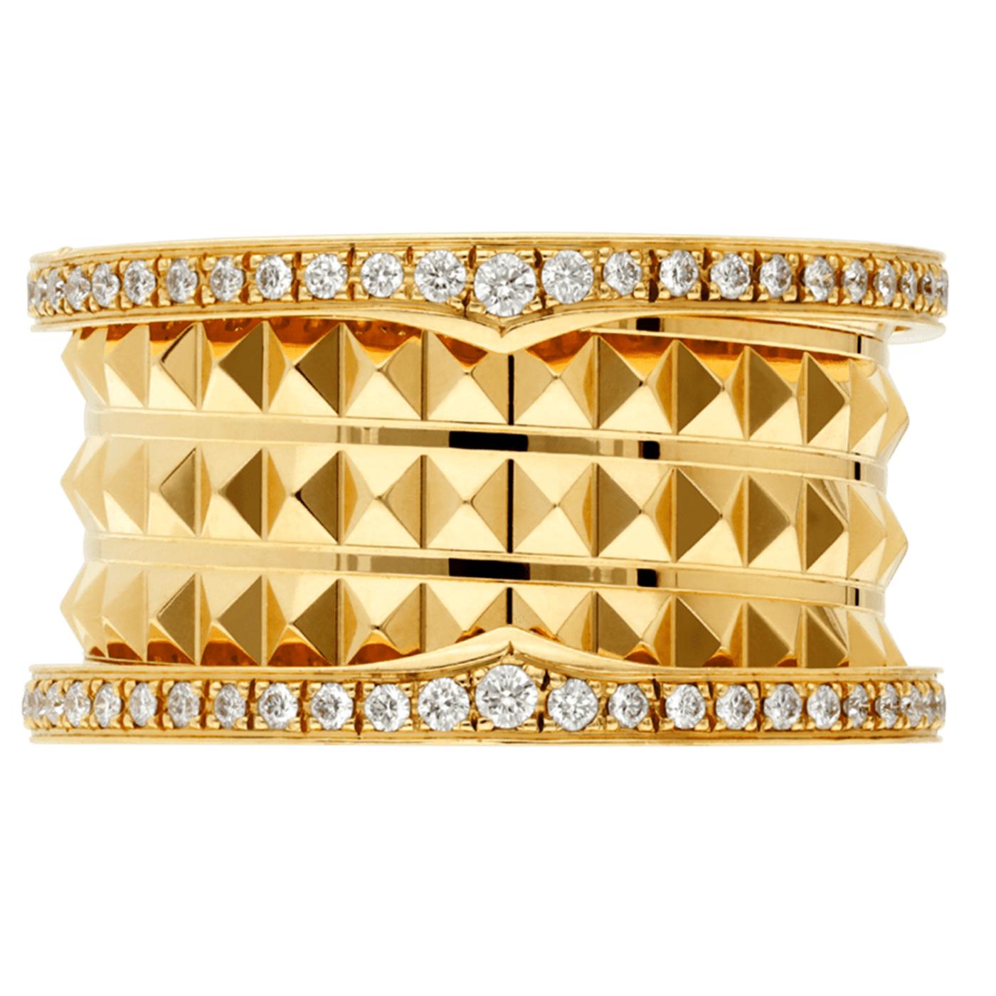 B.zero1 Rock four-band ring in 18 kt yellow gold with studded spiral and pavé diamonds on the edges. Drawing its inspiration from the world’s most renowned amphitheater, the Colosseum, B.zero1 Rock is a groundbreaking statement of Bvlgari’s creative