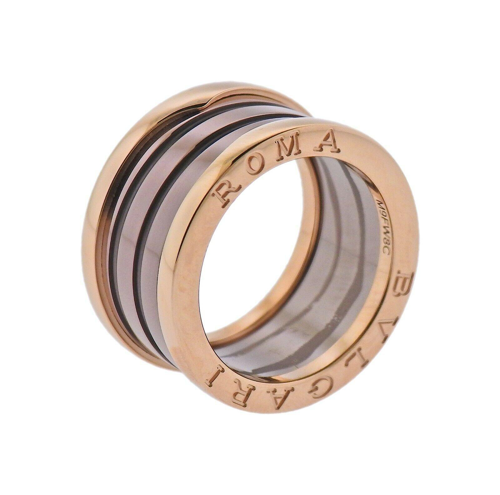 New 18k rose gold and bronze ceramic B.Zero1 band ring by Bvlgari, in size 54.  Size 6 1/2', EU size 54, 12mm wide . Marked: Bvlgari, Roma, M9FW8C, Made in Italy, 750 . Weight - 9.5 grams. 