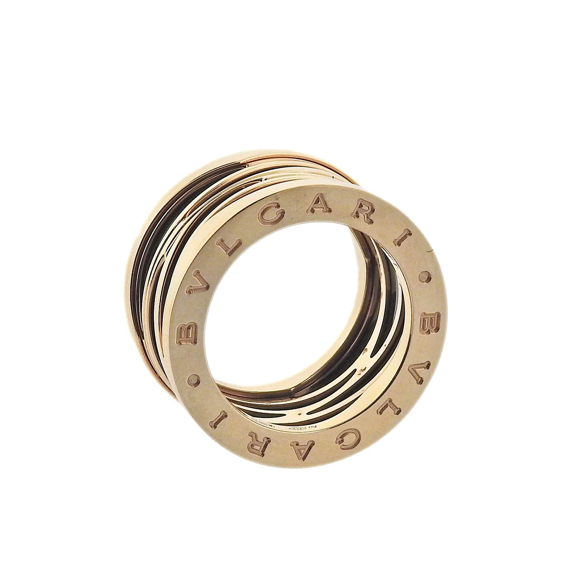 18k rose gold Bvlgari B.Zero1Legend design ring with black ceramic. Ring size  6 ( 52 ) and 14mm wide. Marked: Bvlgari, made in Italy, Italian marks, 750, Serial Number. Weight is 14.8 grams. Retail $3050. Comes with COA and box.