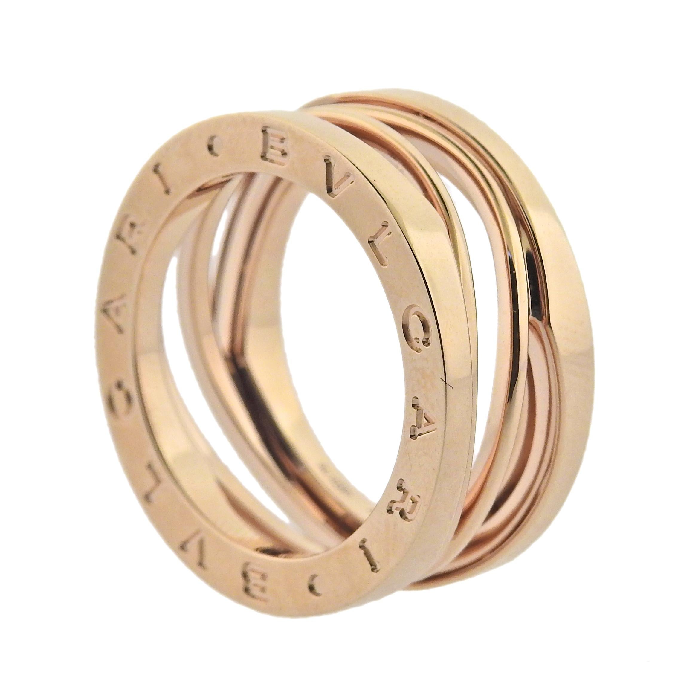 18k rose gold Bvlgari B.Zero1 ring. Retail $2740. Comes with COA and box.  Ring size 7, ring is 10mm wide. Marked Bvlgari, made in Italy, Italian mark, 750, Serial number. Weight 10.2 grams