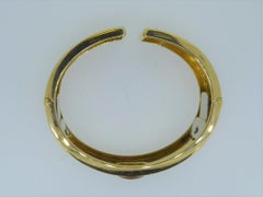 Bulgari Cabochon Ruby and 18 Carat Yellow Gold Hinged Bracelet Bangle