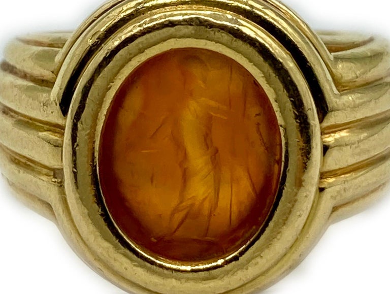 A vintage Bulgari 18 karat gold ring featuring an ancient Roman carnelian intaglio.